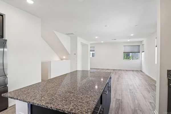 a view of a kitchen cabinets