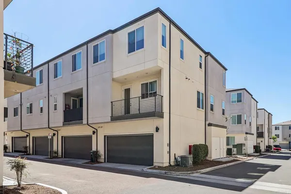 a front view of a building with a street