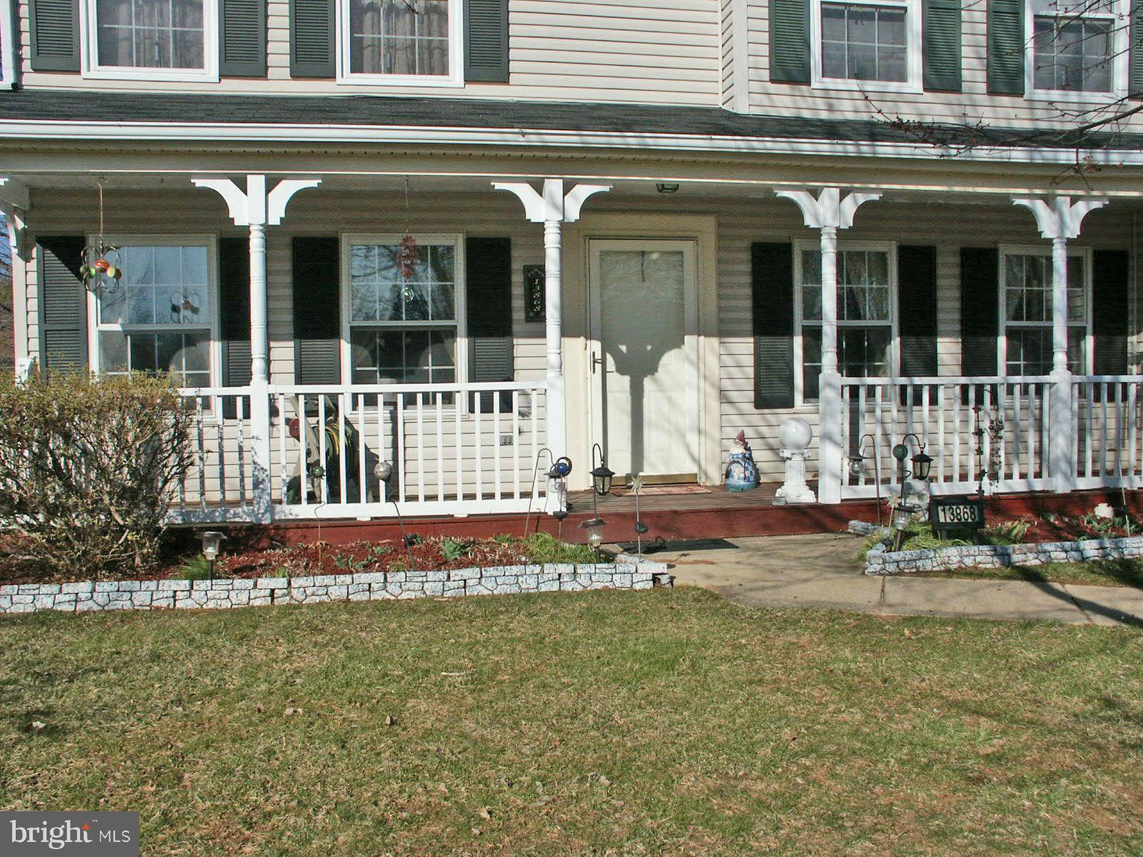 13868 Racine Court Woodbridge, VA 22193 - Photo 2 of 29 front view of a house with a yard balcony