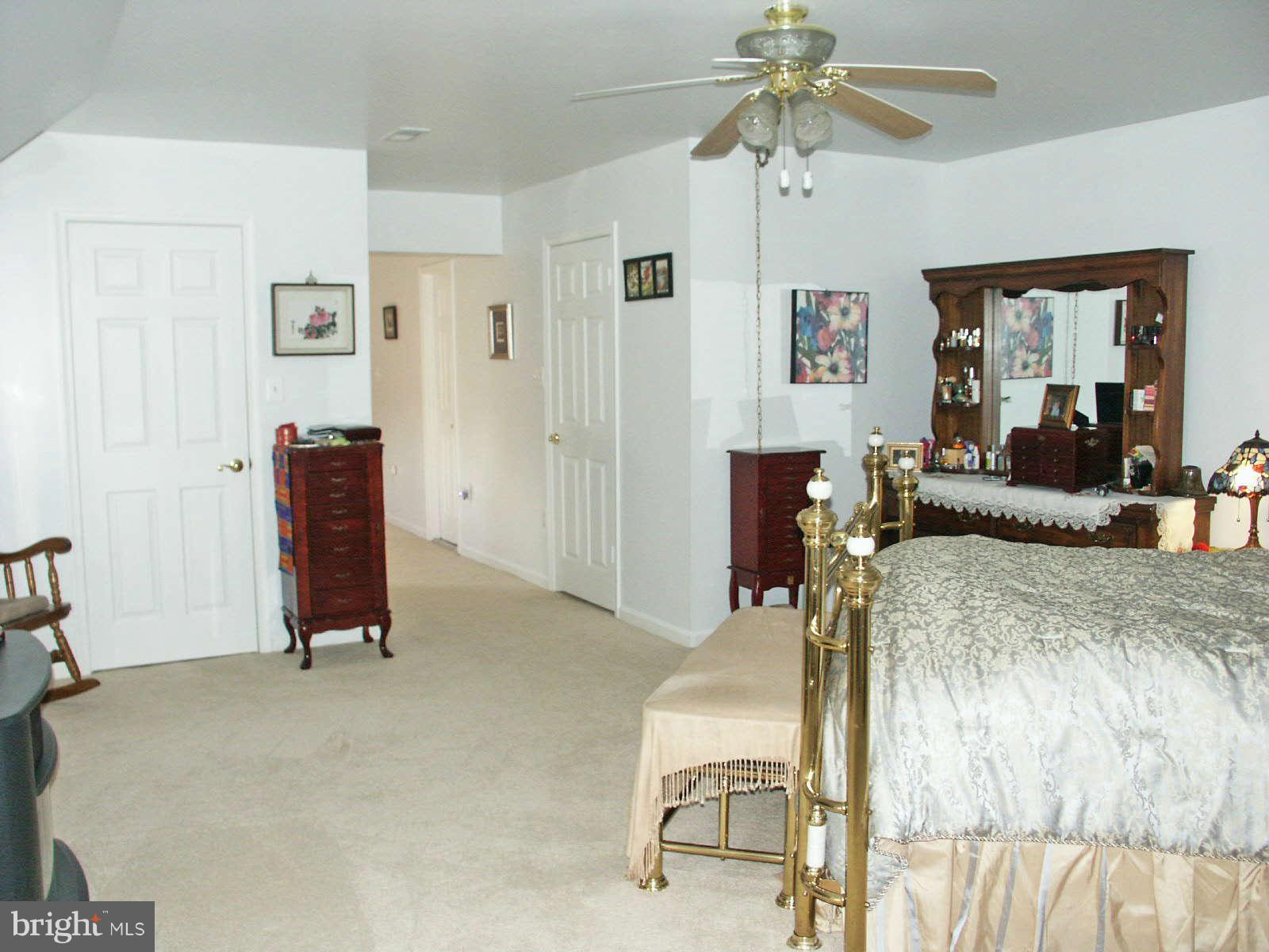 13868 Racine Court Woodbridge, VA 22193 - Photo 17 of 29 a living room with furniture and wooden floor