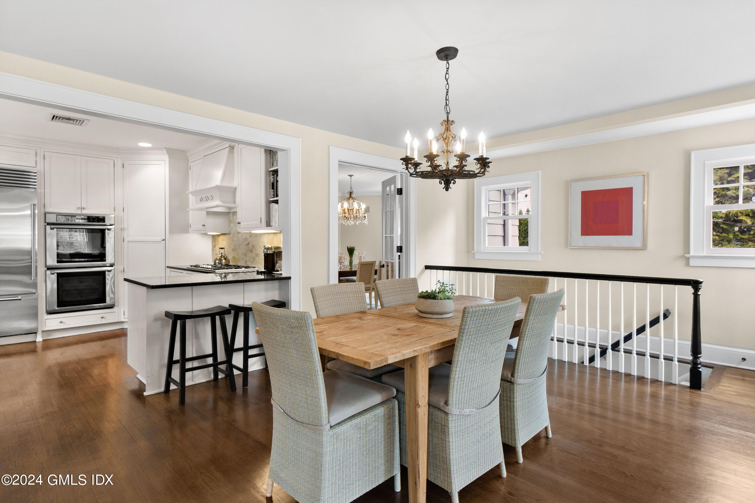 20 Knoll Street Riverside, CT 06878 - Photo 11 of 27 a view of a dining room with furniture and wooden floor