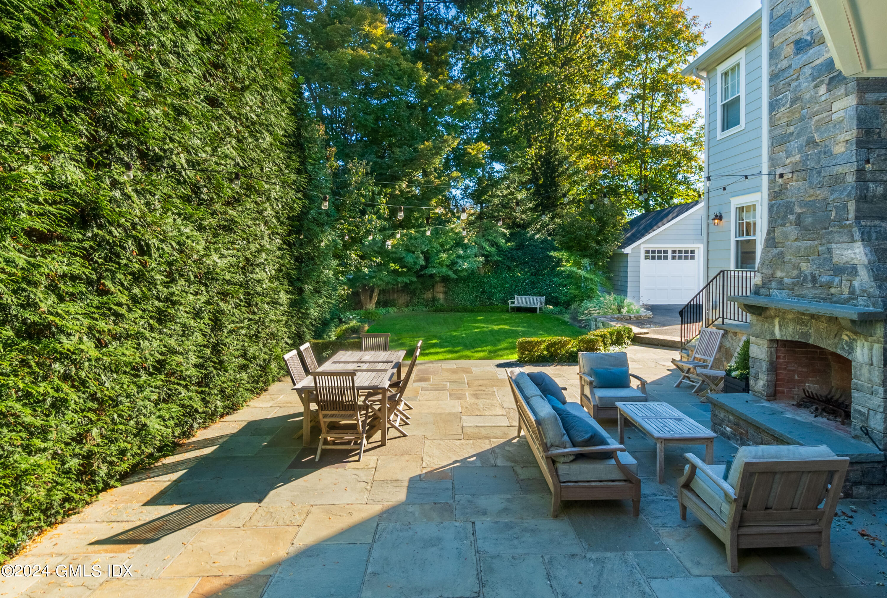 20 Knoll Street Riverside, CT 06878 - Photo 21 of 27 a swimming pool with outdoor seating and yard