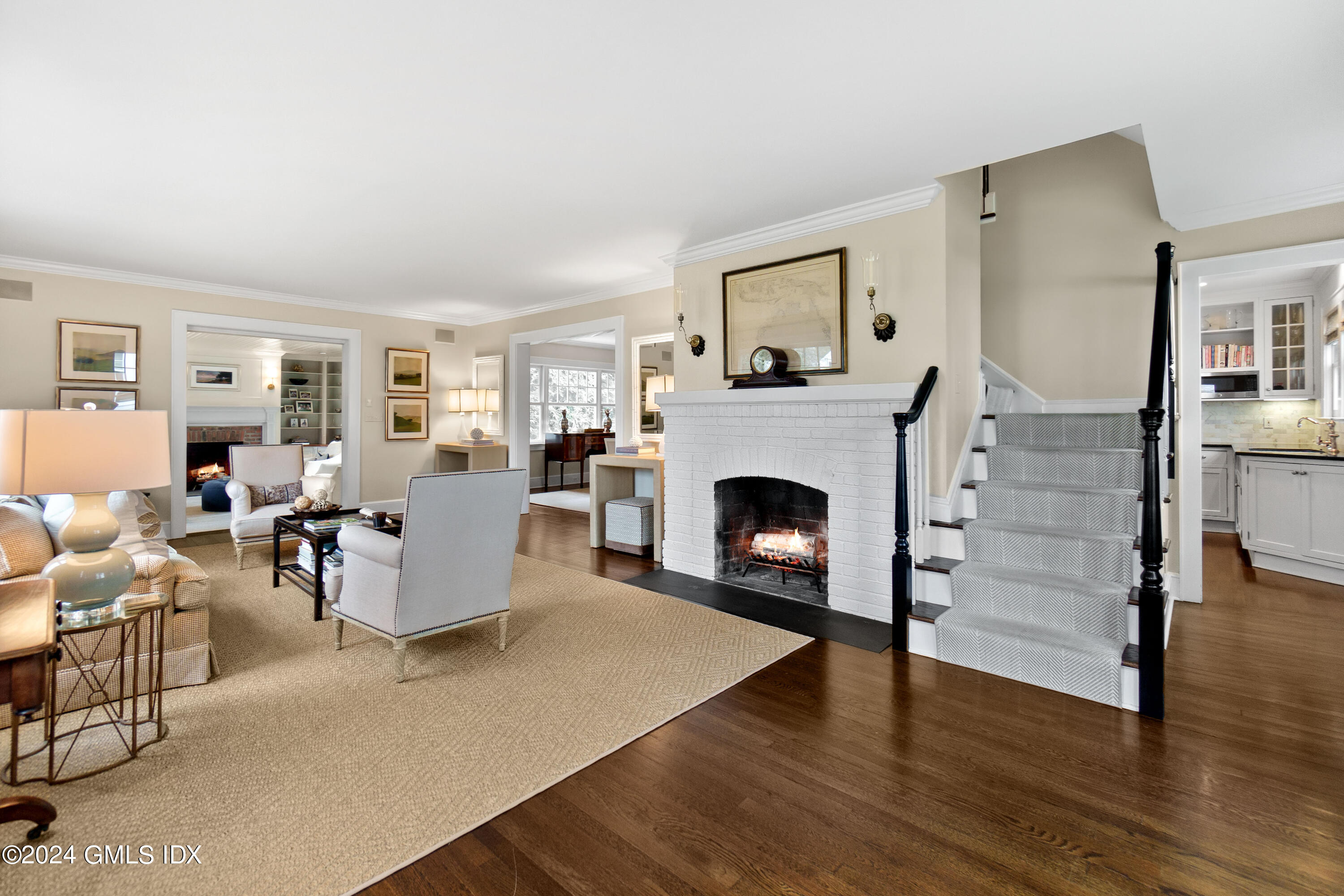 20 Knoll Street Riverside, CT 06878 - Photo 3 of 27 a living room with furniture a fireplace and a table