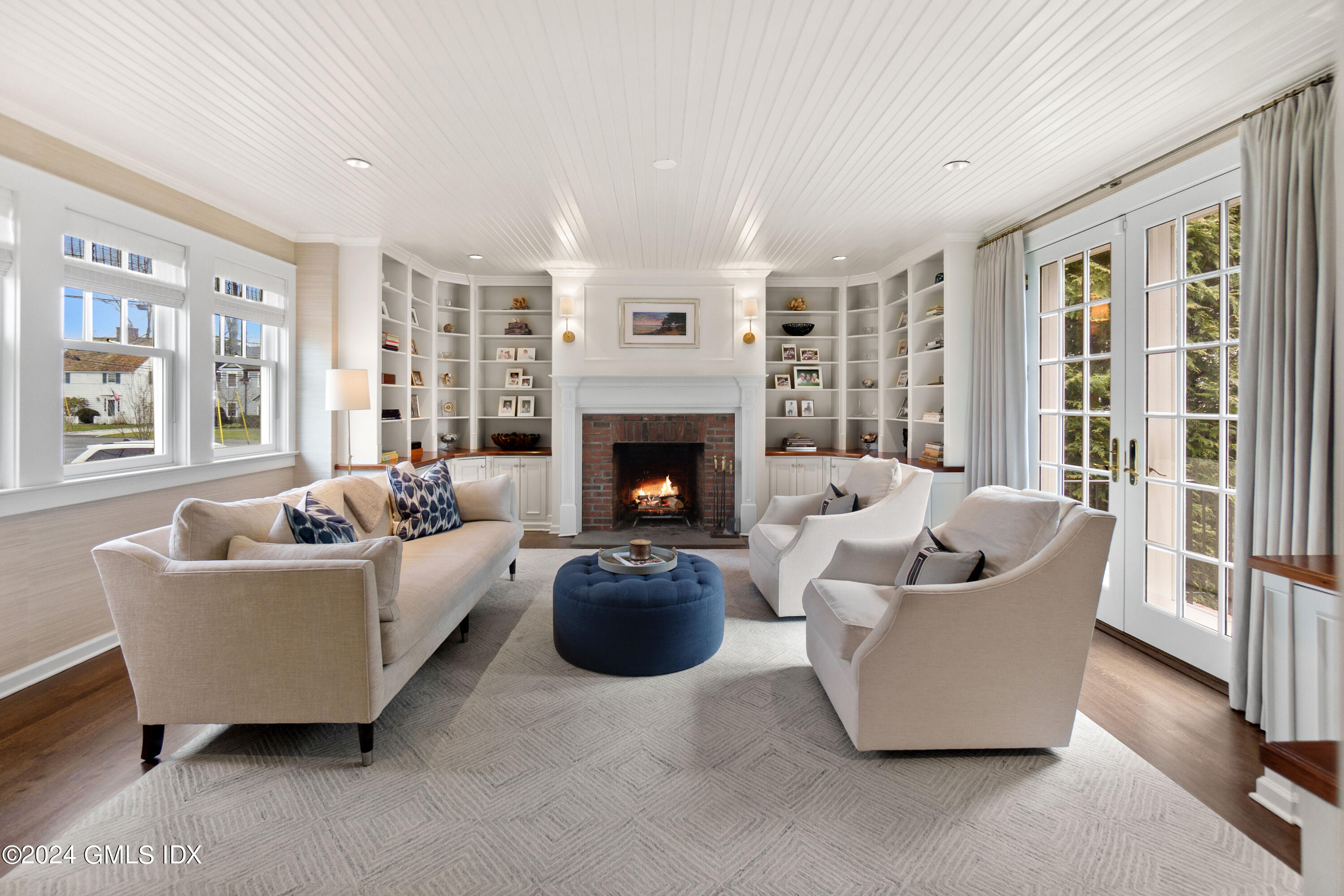 20 Knoll Street Riverside, CT 06878 - Photo 5 of 27 a living room with furniture and a fireplace