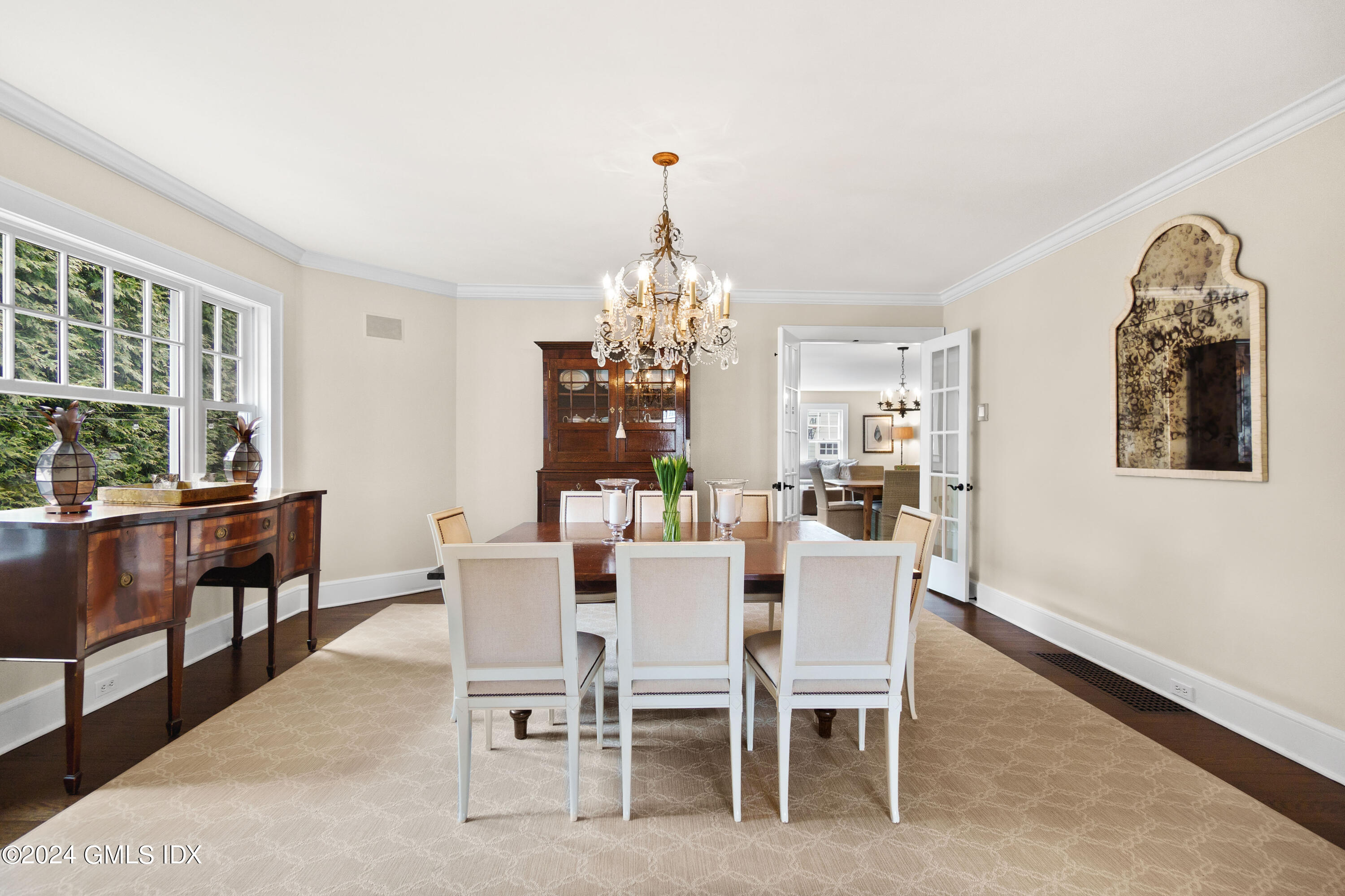 20 Knoll Street Riverside, CT 06878 - Photo 6 of 27 a dining room with furniture a chandelier and window