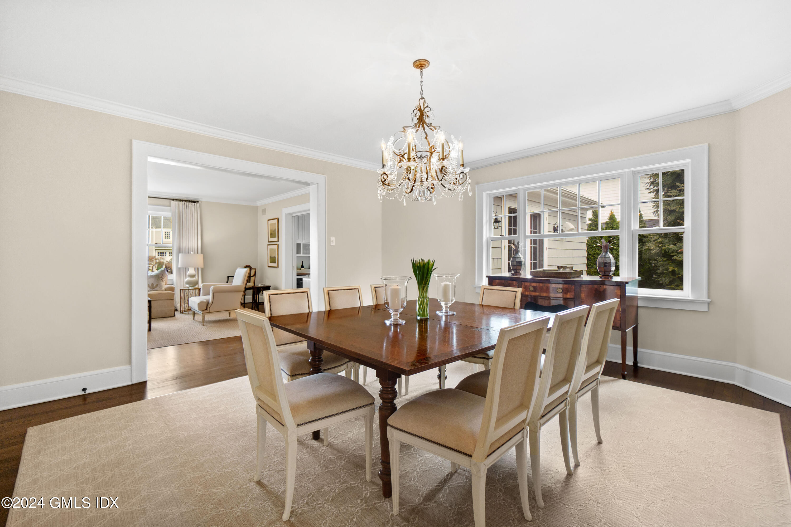 20 Knoll Street Riverside, CT 06878 - Photo 7 of 27 a view of a dining room with furniture and chandelier