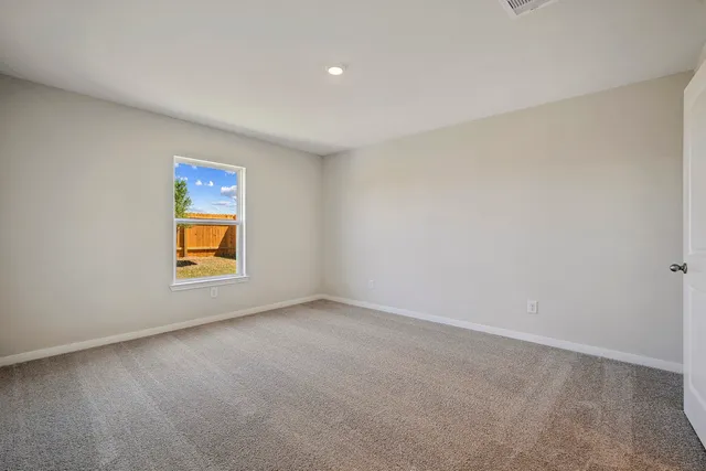 an empty room with window