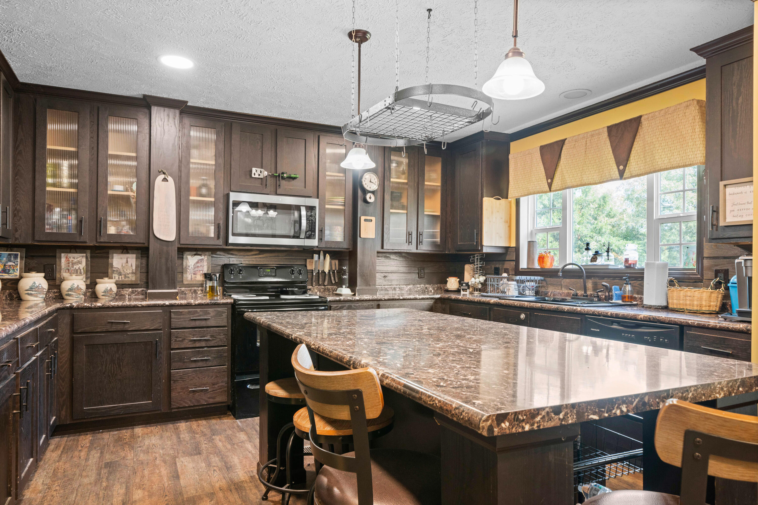 8320 Thames Road Baker, FL 32531 - Photo 21 of 48 a kitchen with stainless steel appliances granite countertop counter space a sink and cabinets