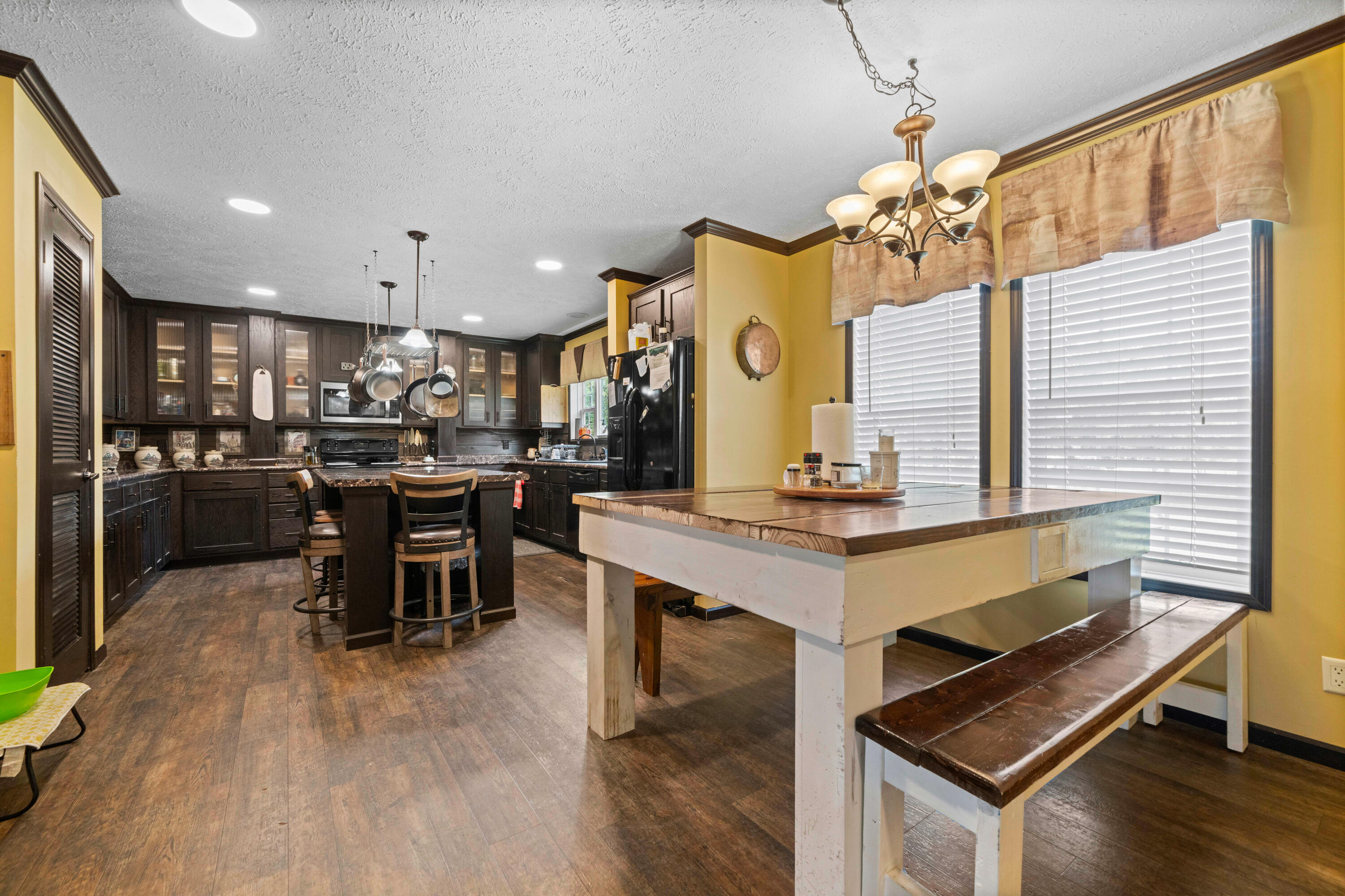 8320 Thames Road Baker, FL 32531 - Photo 26 of 48 a kitchen with a table and chairs in it