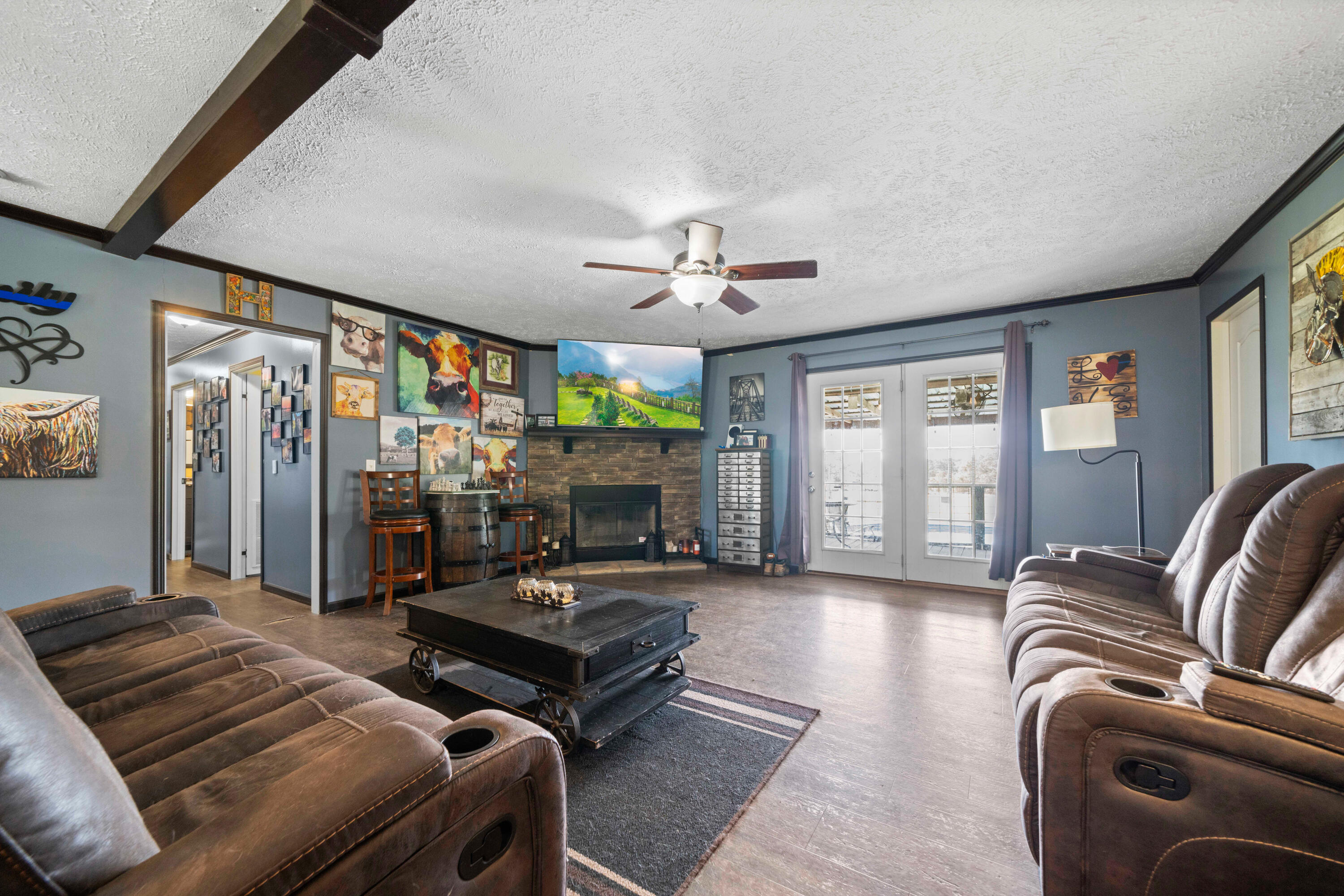 8320 Thames Road Baker, FL 32531 - Photo 29 of 48 a bedroom with furniture and wooden floor
