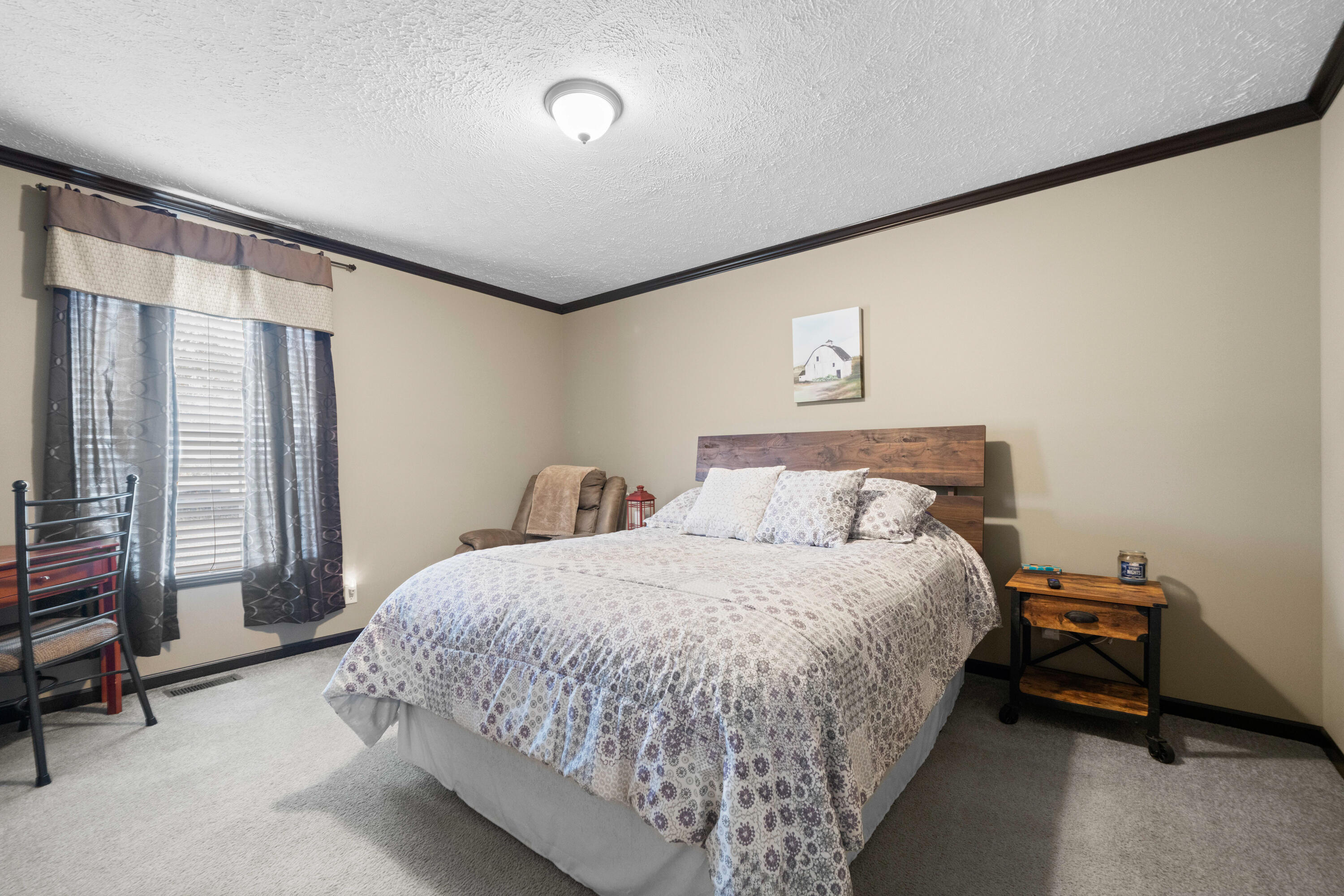 8320 Thames Road Baker, FL 32531 - Photo 36 of 48 a bedroom with a bed and a window
