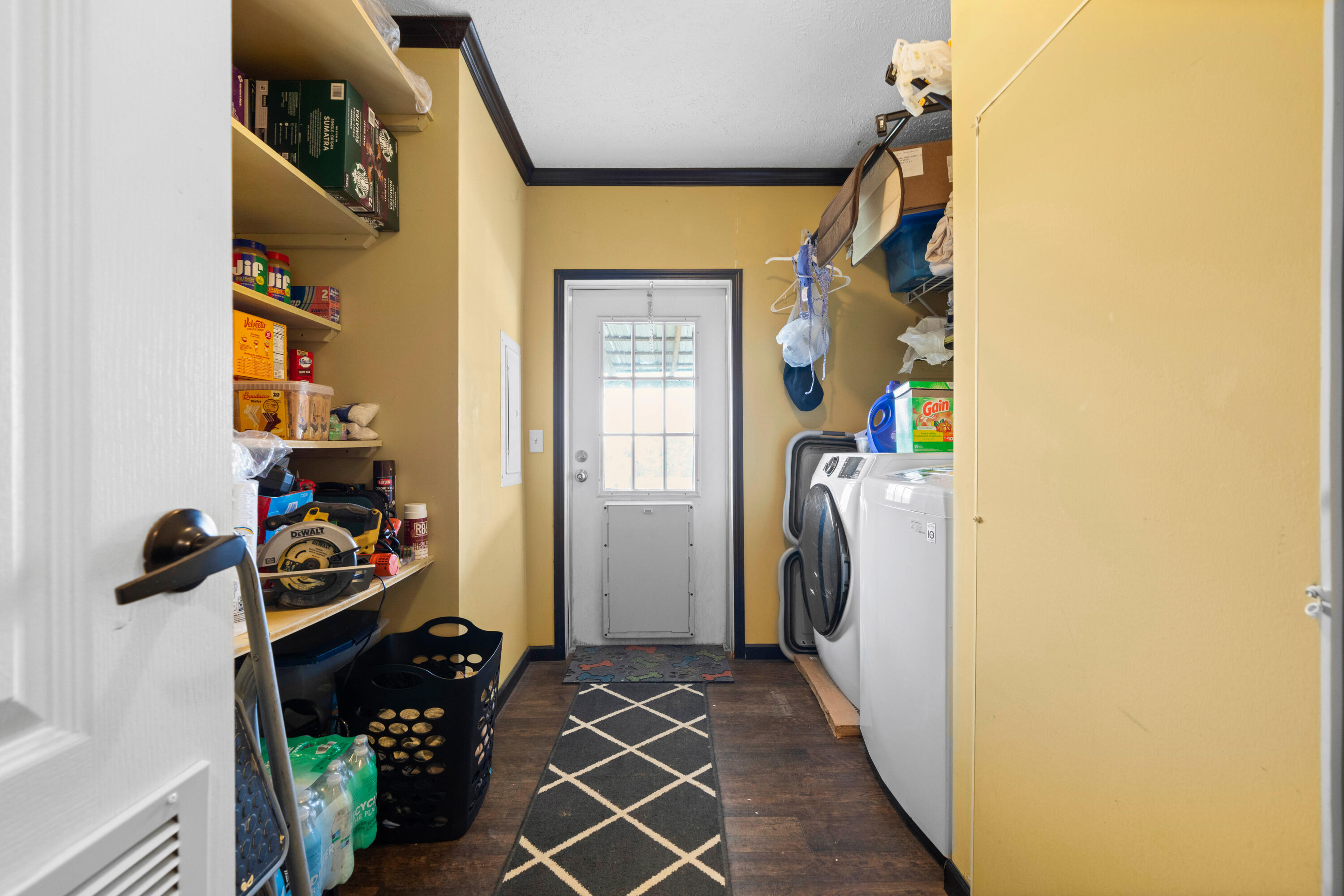 8320 Thames Road Baker, FL 32531 - Photo 40 of 48 a view of walk in closet with clothes and shoes
