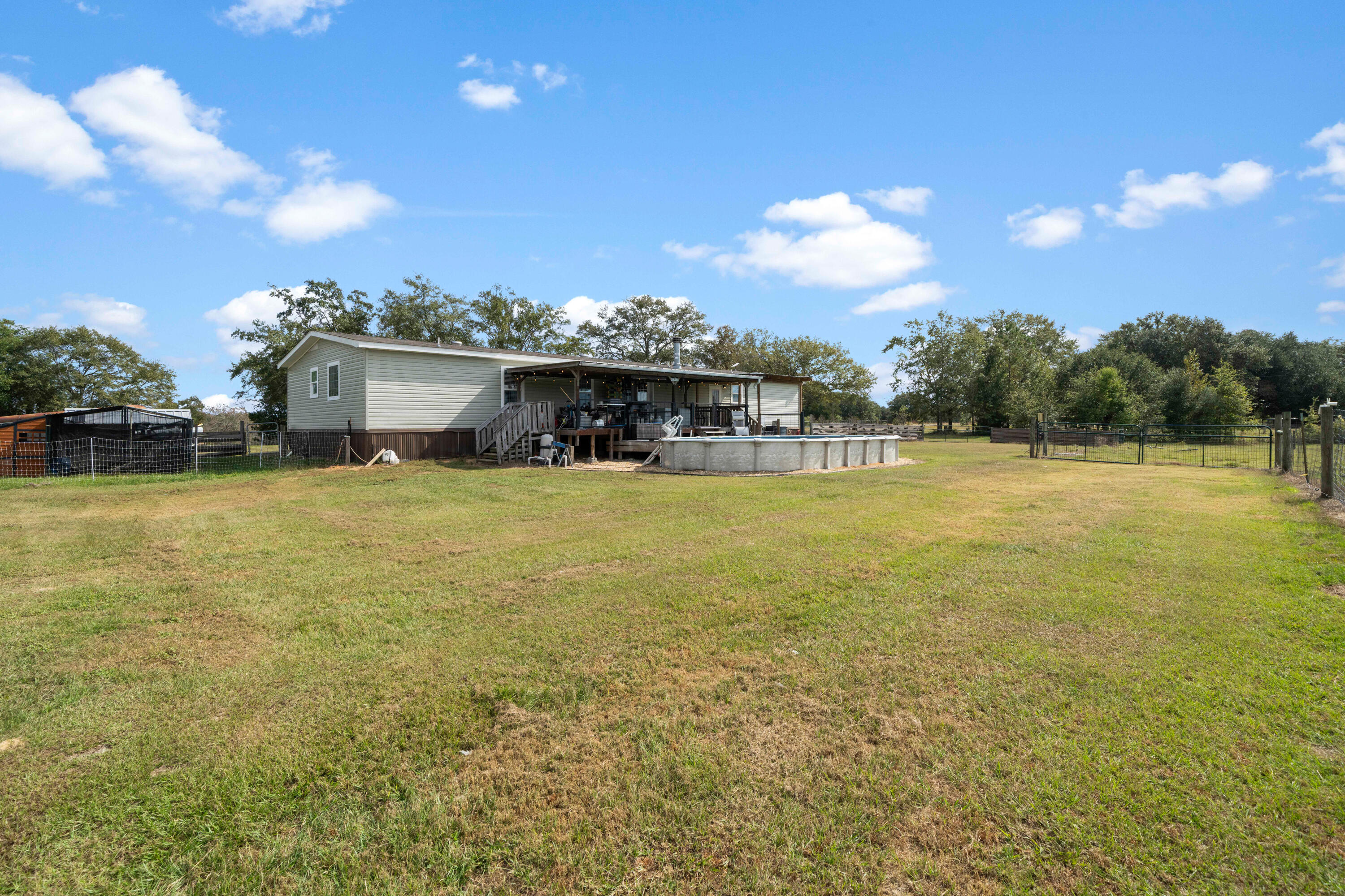 8320 Thames Road Baker, FL 32531 - Photo 45 of 48 a view of a swimming pool with an ocean view
