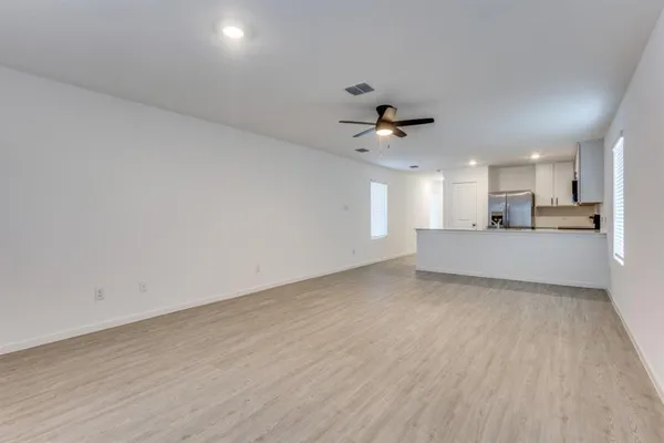 a view of a kitchen with a sink and a dishwasher