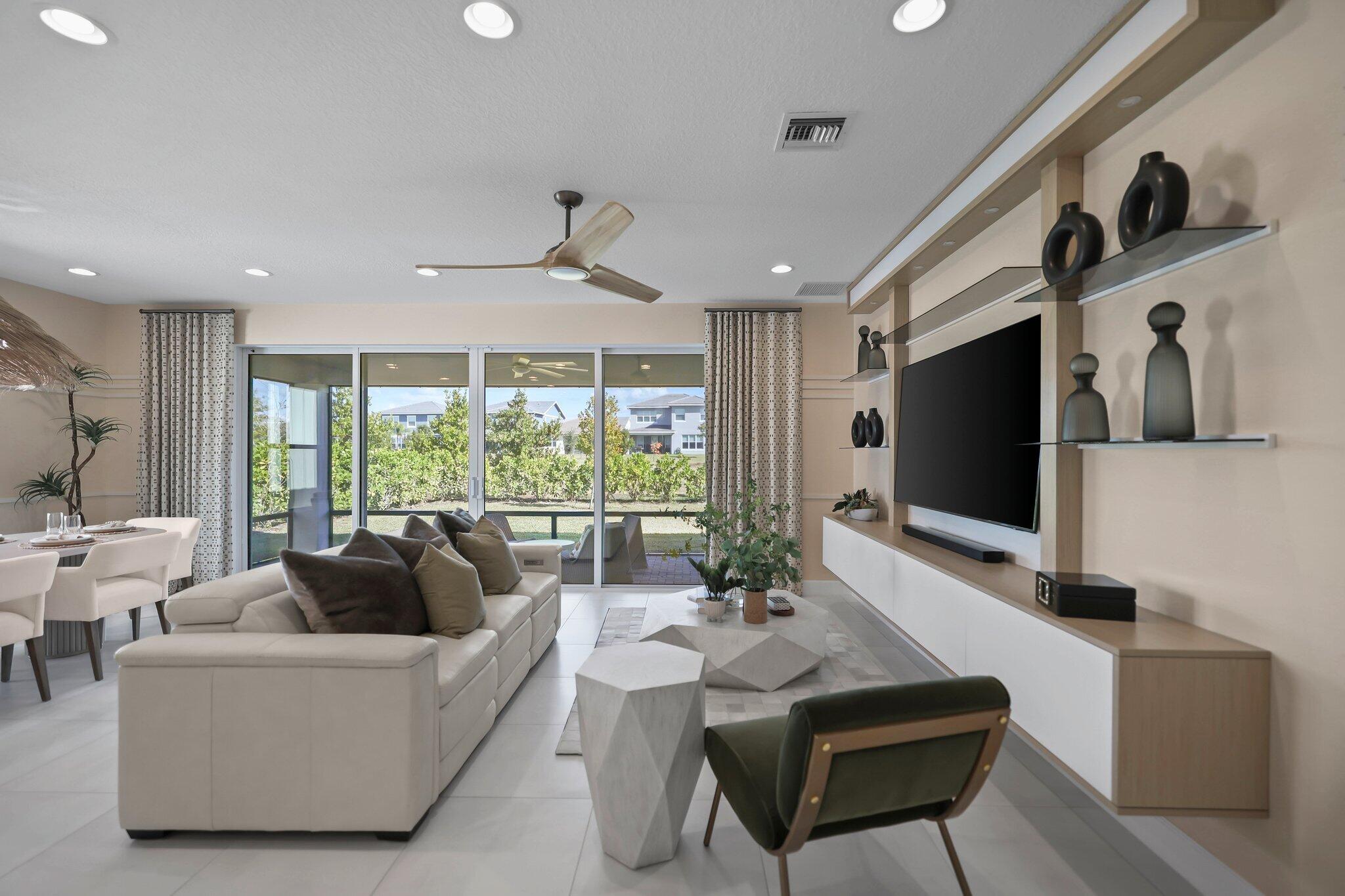 19545 Broad Shore Walk Loxahatchee, FL 33470 - Photo 17 of 65 a living room with furniture and a flat screen tv