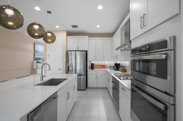 a outdoor dining space with furniture and garden view