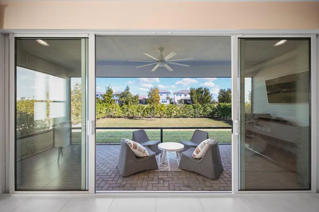 a view of a backyard of the house