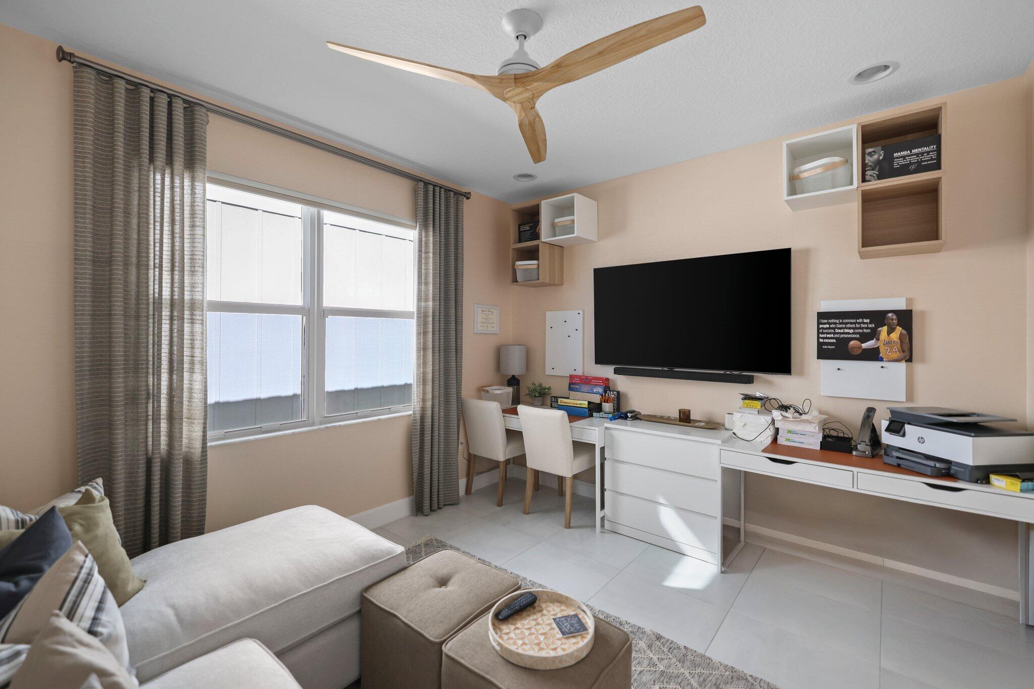 19545 Broad Shore Walk Loxahatchee, FL 33470 - Photo 6 of 65 a living room with furniture and a flat screen tv