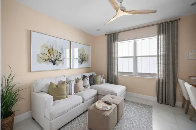 a living room with furniture and a window