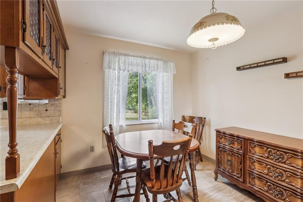 957 Cherry Lane Road Apollo, PA 15613 - Photo 12 of 38 a dining room with furniture and window