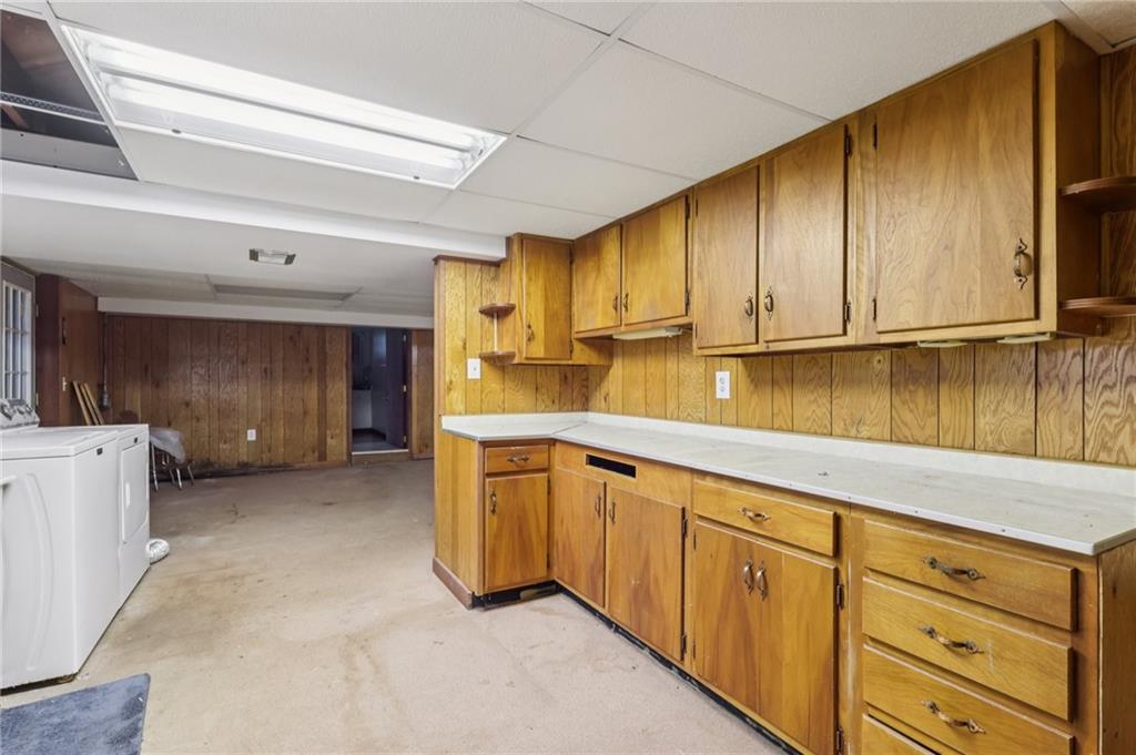 957 Cherry Lane Road Apollo, PA 15613 - Photo 25 of 38 a kitchen with sink cabinets and window