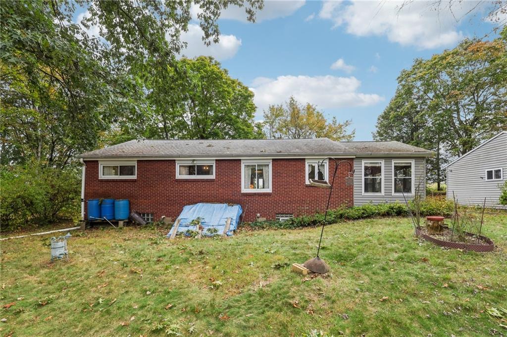 957 Cherry Lane Road Apollo, PA 15613 - Photo 33 of 38 a view of a yard in front of a house with large trees