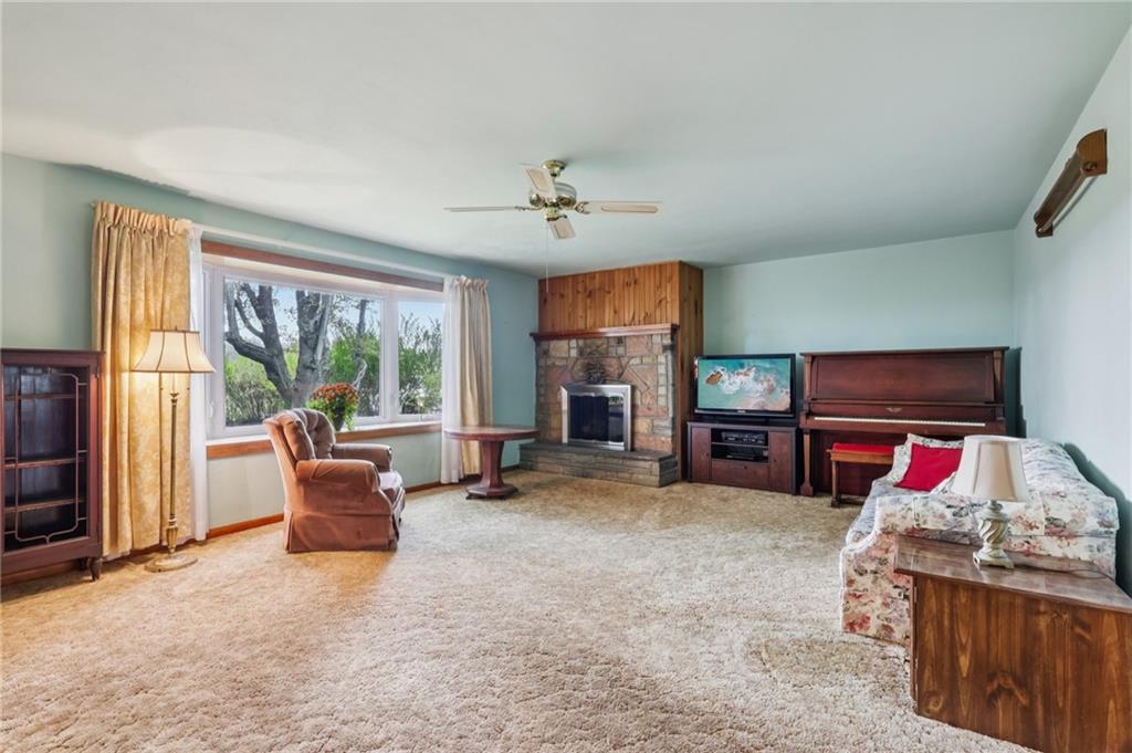 957 Cherry Lane Road Apollo, PA 15613 - Photo 6 of 38 a view of a livingroom with furniture and a flat screen tv