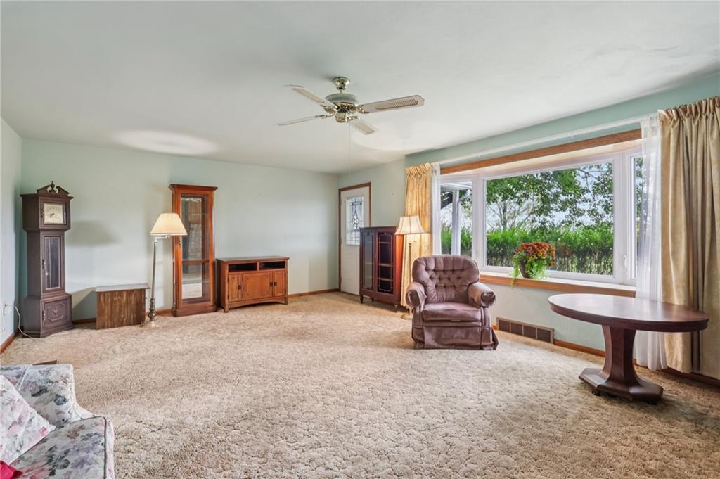 957 Cherry Lane Road Apollo, PA 15613 - Photo 7 of 38 a living room with furniture and a large window