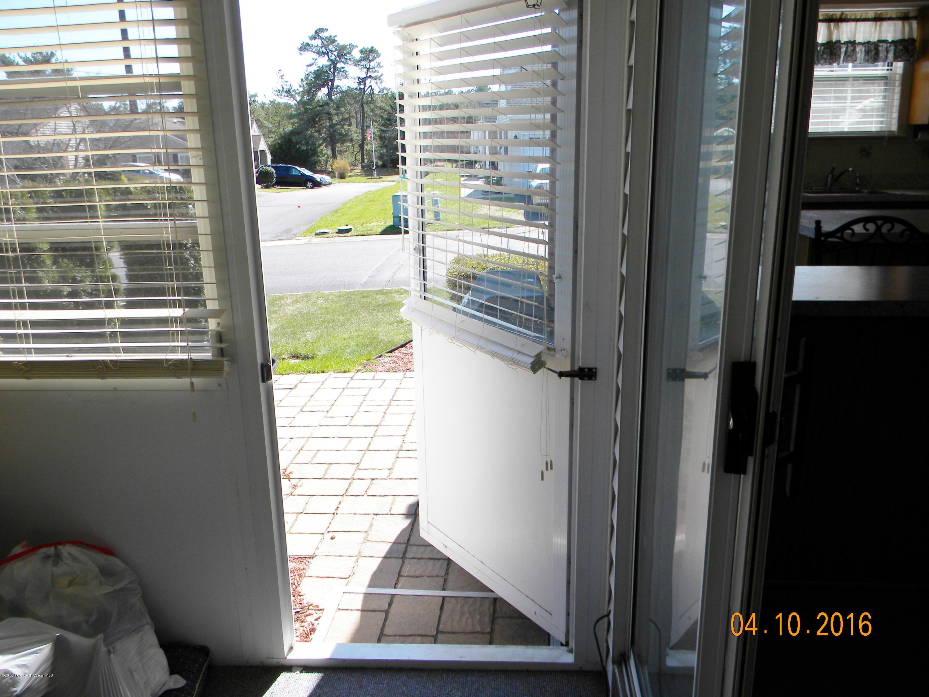 34A Ashley Road, Unit D Whiting, NJ 08759 - Photo 12 of 35 a view of a balcony from a room