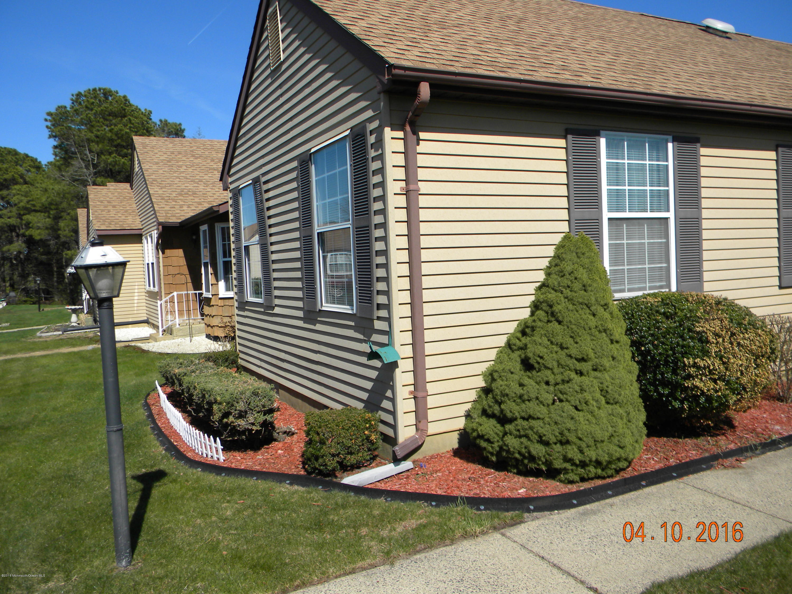 34A Ashley Road, Unit D Whiting, NJ 08759 - Photo 2 of 35 a view of a house with a yard