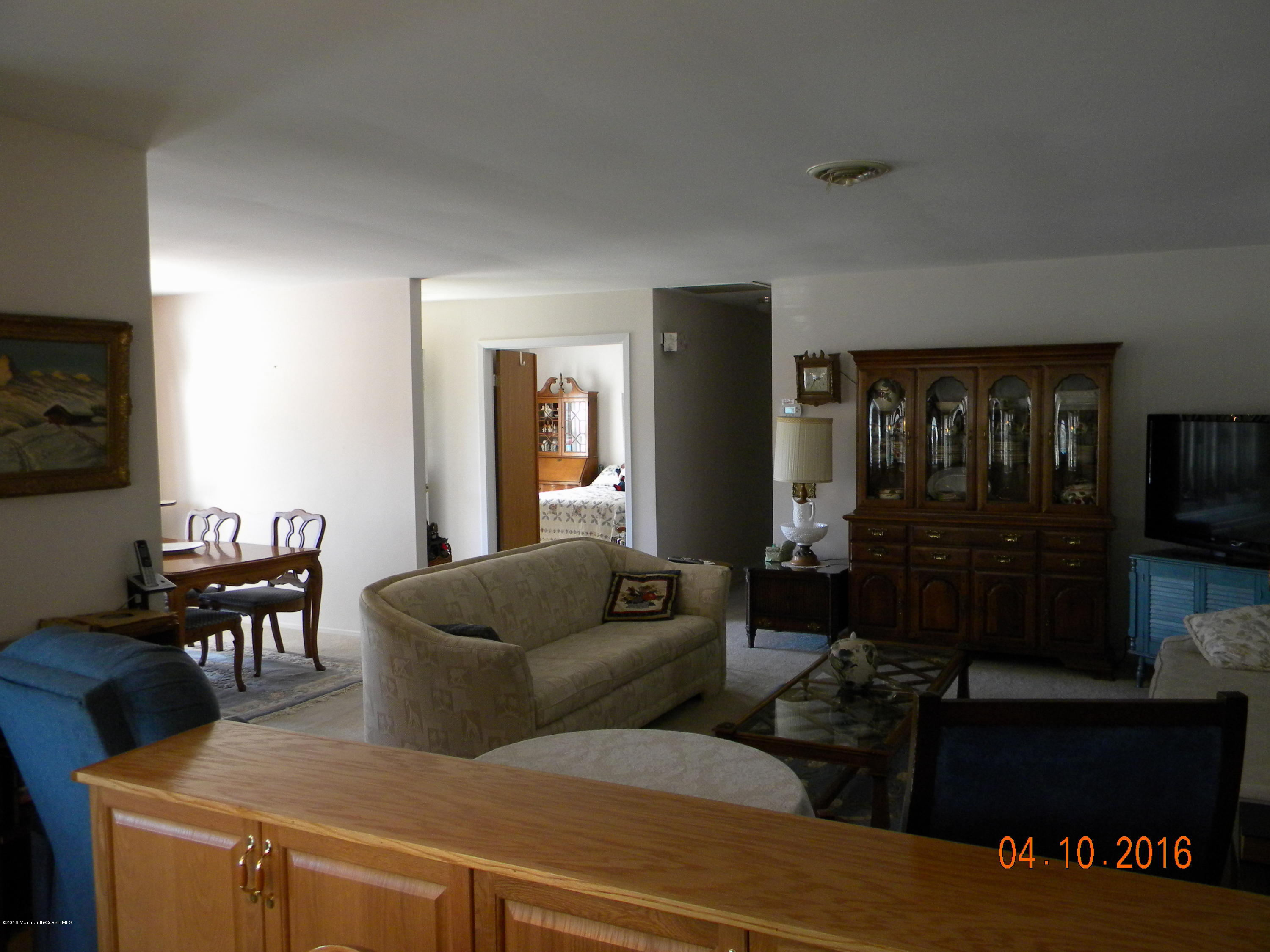 34A Ashley Road, Unit D Whiting, NJ 08759 - Photo 21 of 35 a living room with furniture and a large window