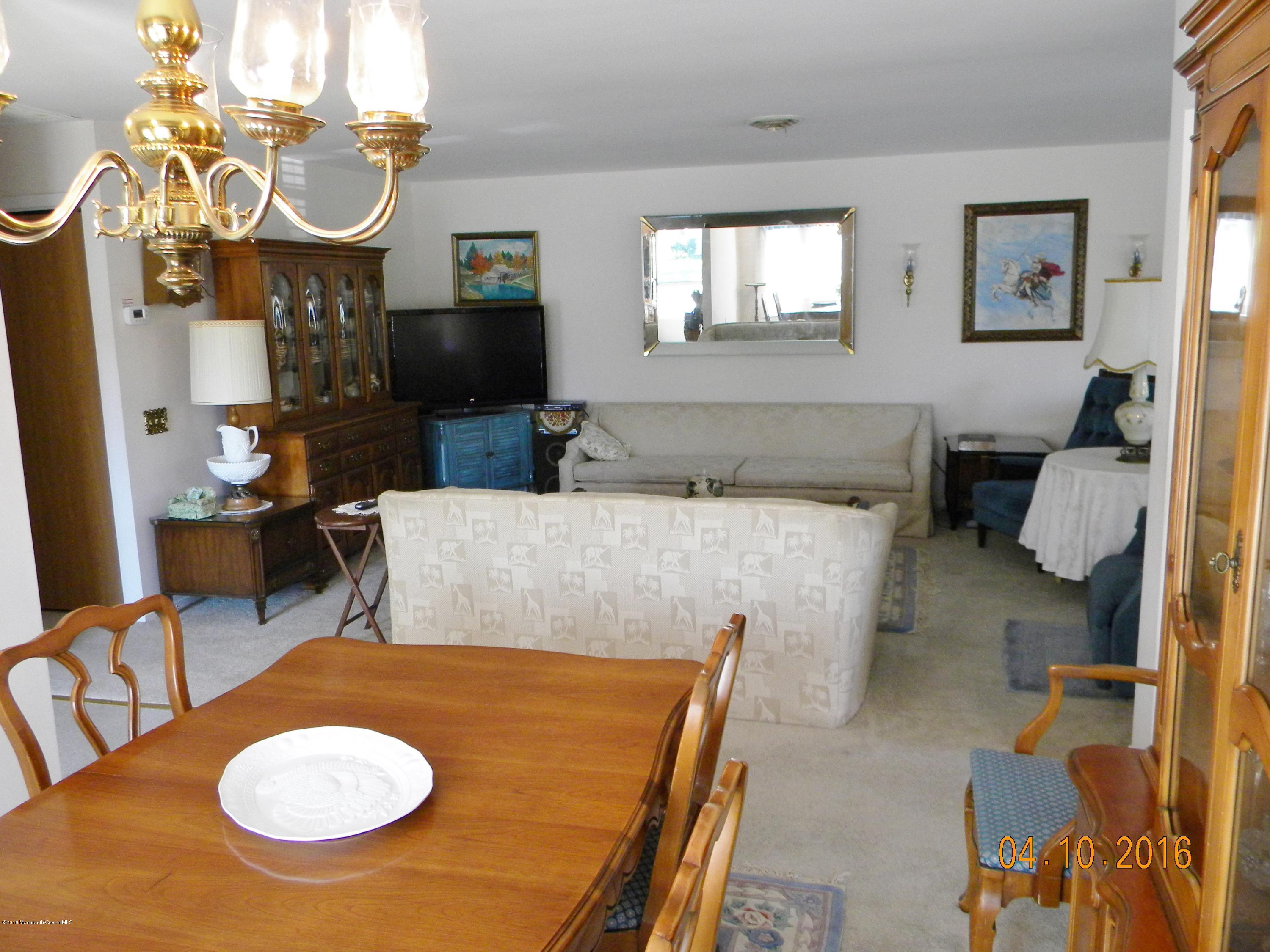 34A Ashley Road, Unit D Whiting, NJ 08759 - Photo 22 of 35 a living room with furniture and a fireplace