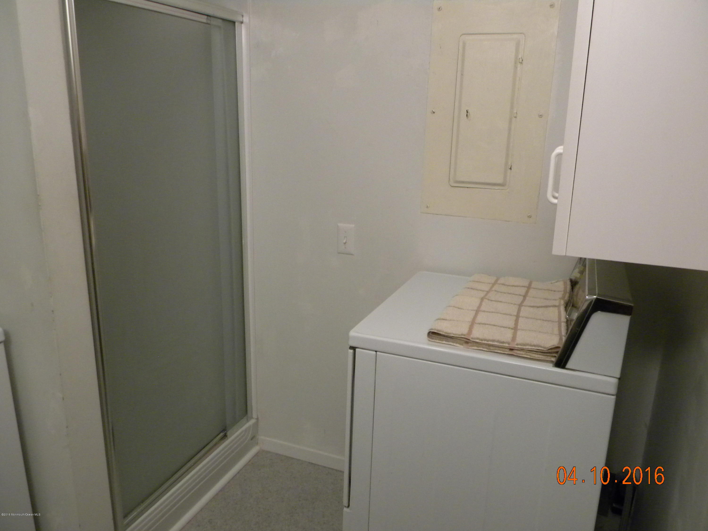 34A Ashley Road, Unit D Whiting, NJ 08759 - Photo 24 of 35 a utility room with dryer and washer