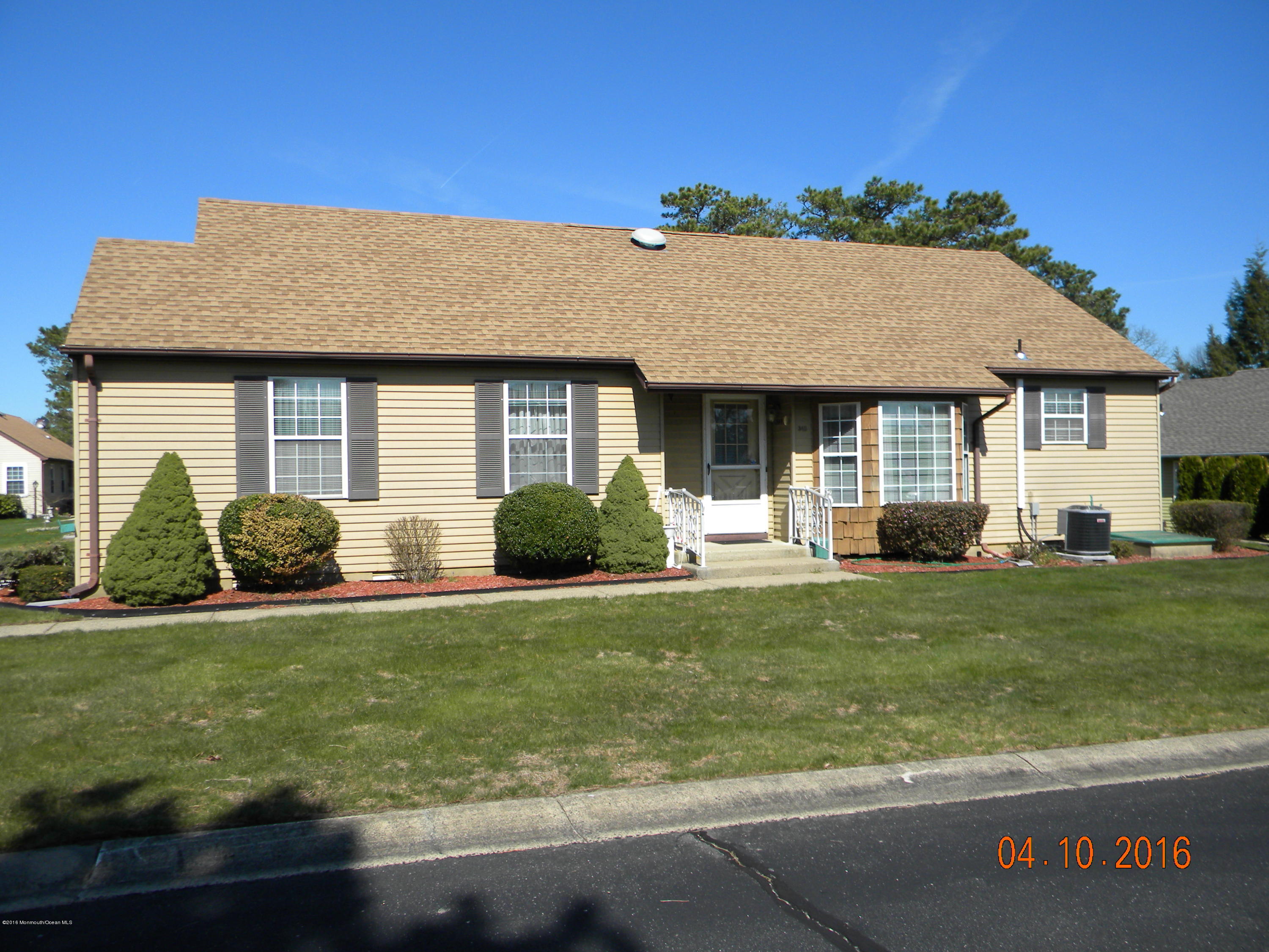 34A Ashley Road, Unit D Whiting, NJ 08759 - Photo 3 of 35 a front view of a house with a yard