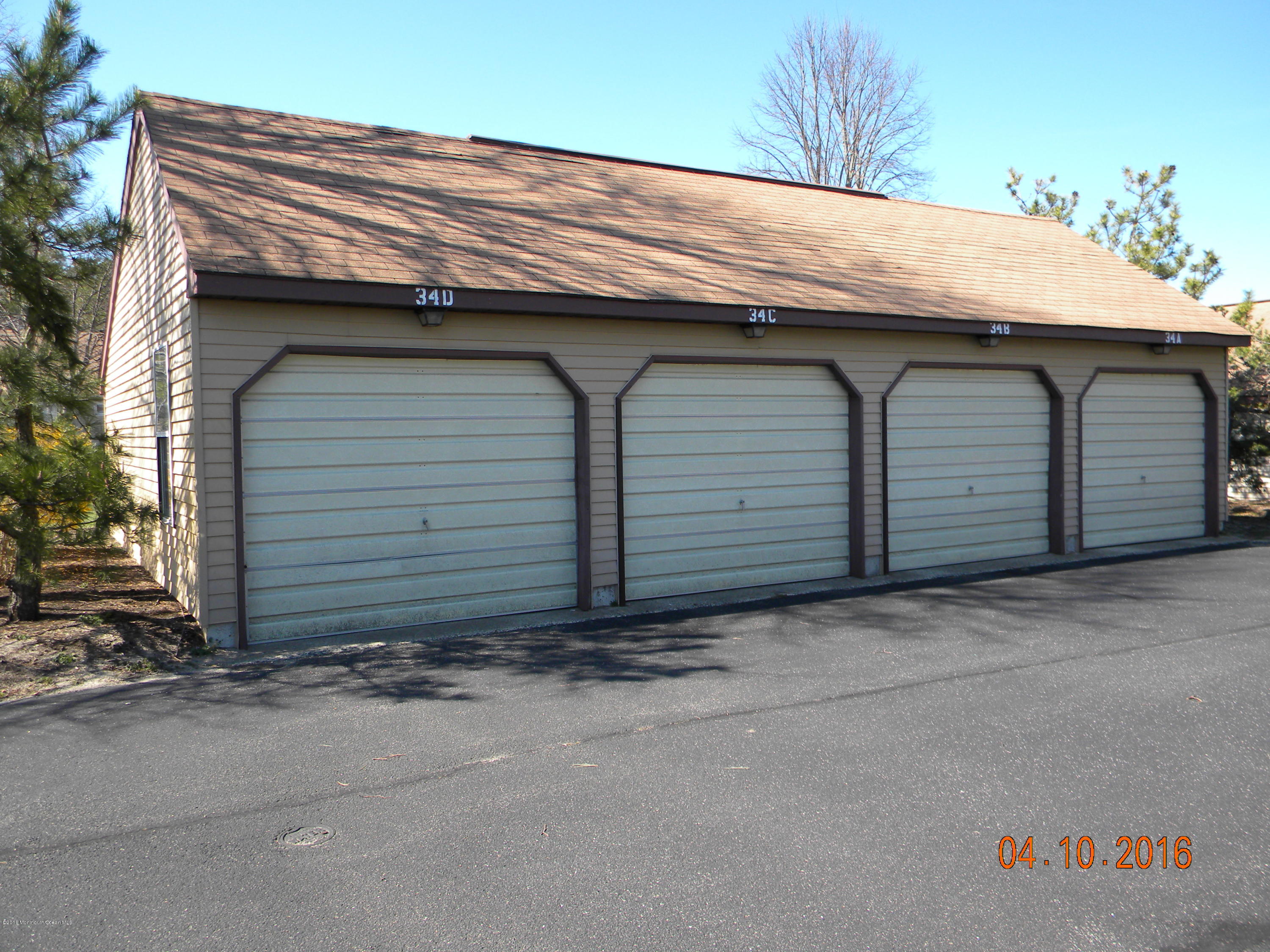 34A Ashley Road, Unit D Whiting, NJ 08759 - Photo 35 of 35 a wooden house with a outdoor space