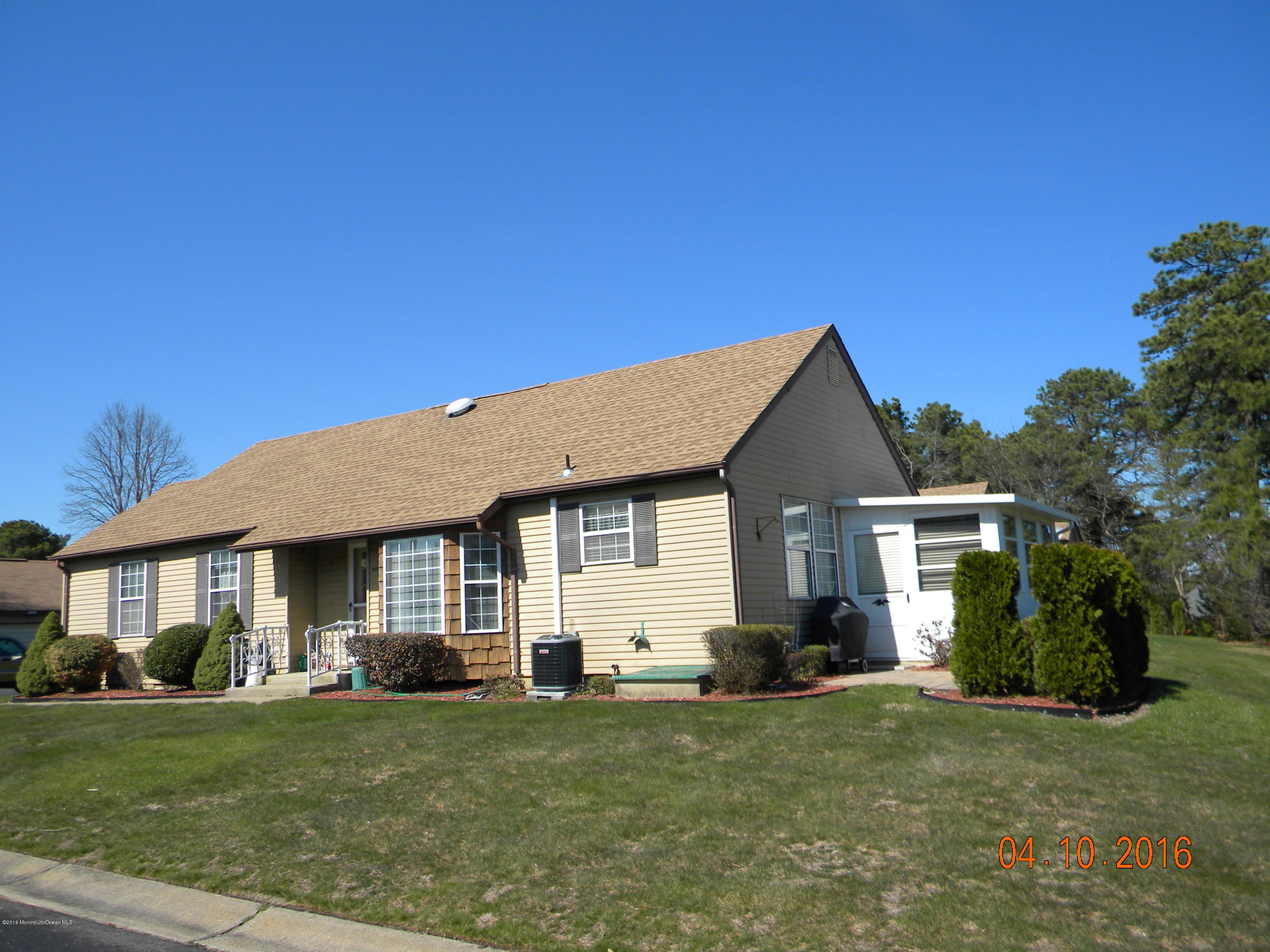 34A Ashley Road, Unit D Whiting, NJ 08759 - Photo 4 of 35 a front view of a house with a garden