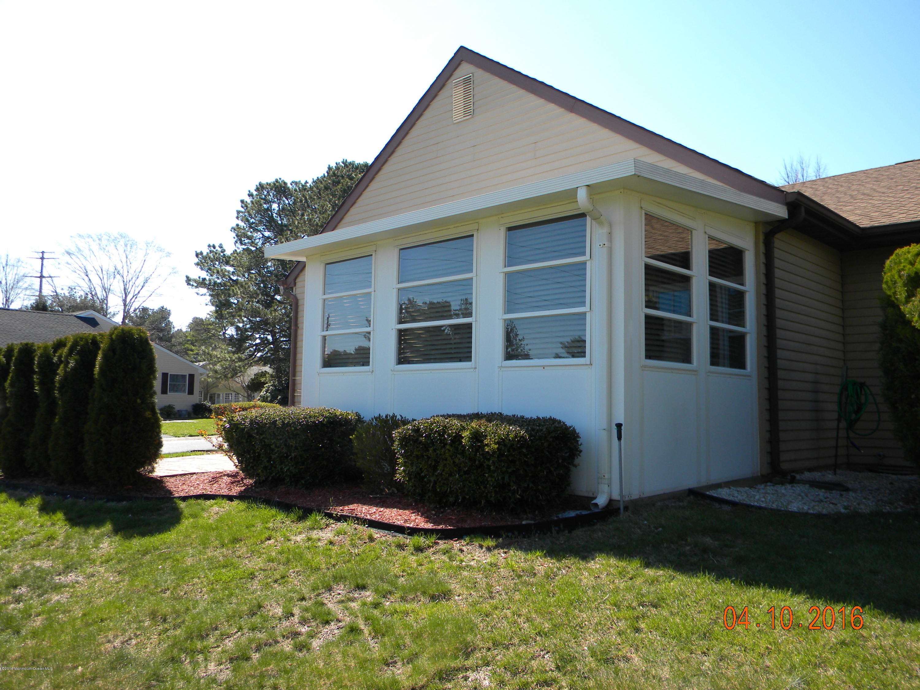 34A Ashley Road, Unit D Whiting, NJ 08759 - Photo 8 of 35 a view of a house with backyard and sitting area