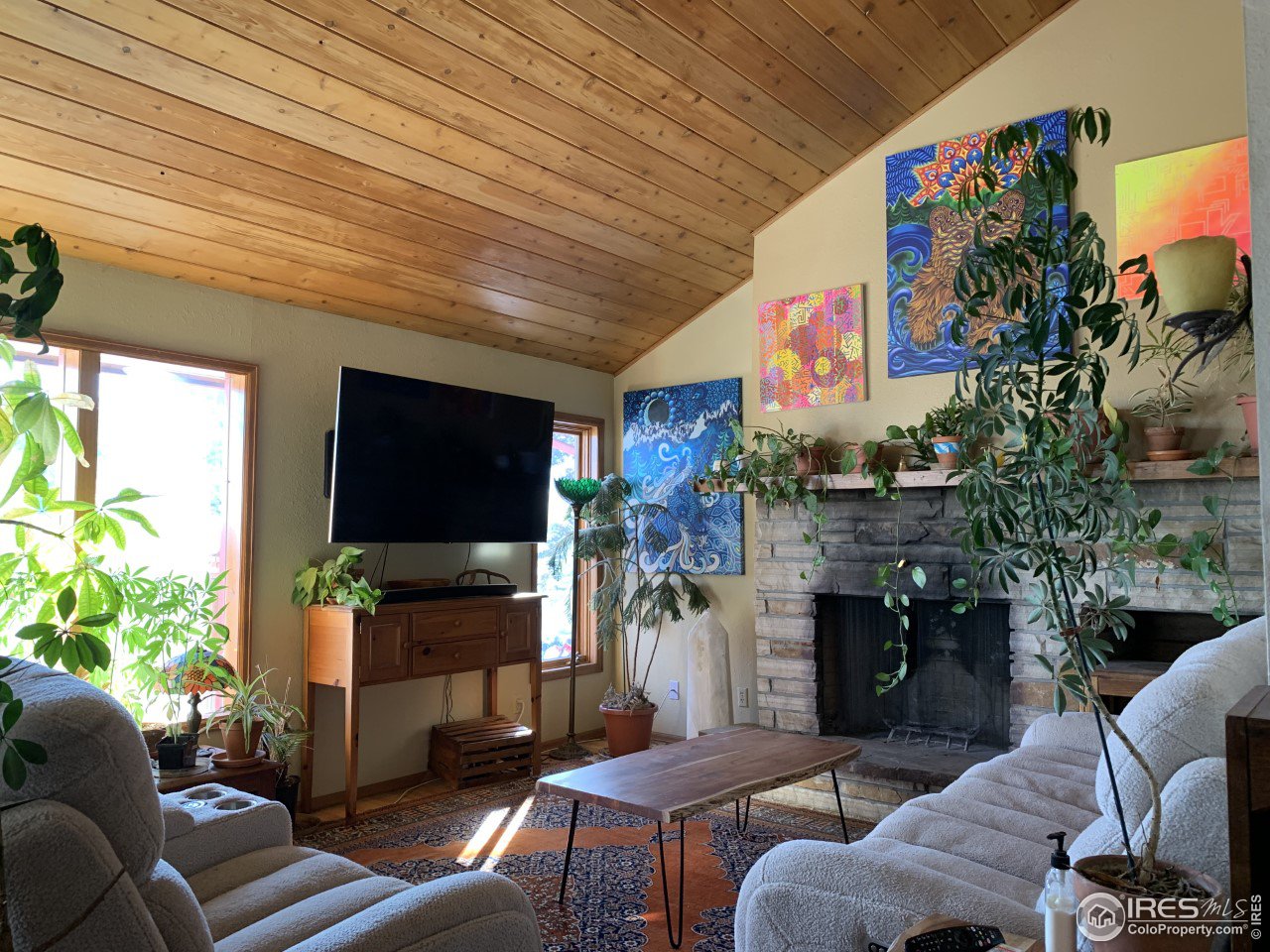 1040 Brook Road Boulder, CO 80302 - Photo 12 of 20 Living Room with Wood Burning Fireplace and City Views