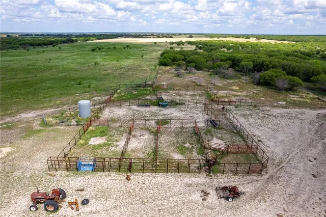 a view of a lake with a yard