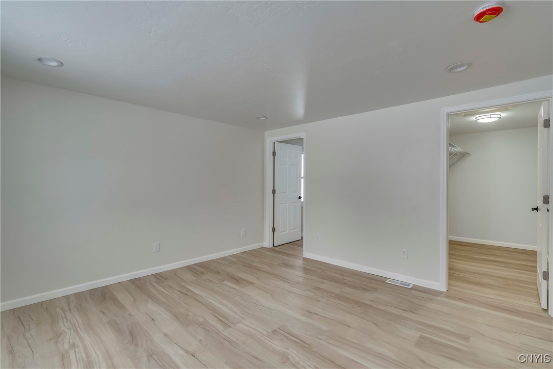 23960 White Road Pamelia, NY 13601 - Photo 14 of 40 Primary bedroom with en-suite bath and walk-in clo