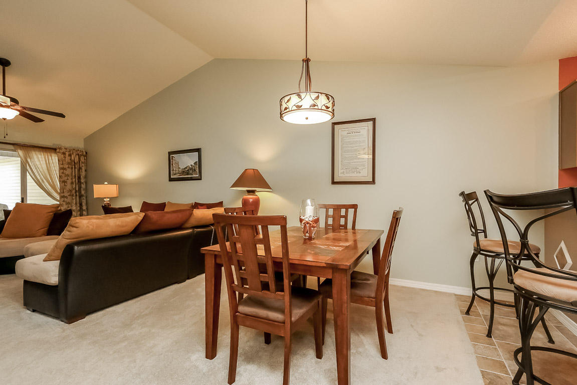 204 Vía Largo Santa Rosa Beach, FL 32459 - Photo 12 of 29 a view of a dining room with furniture