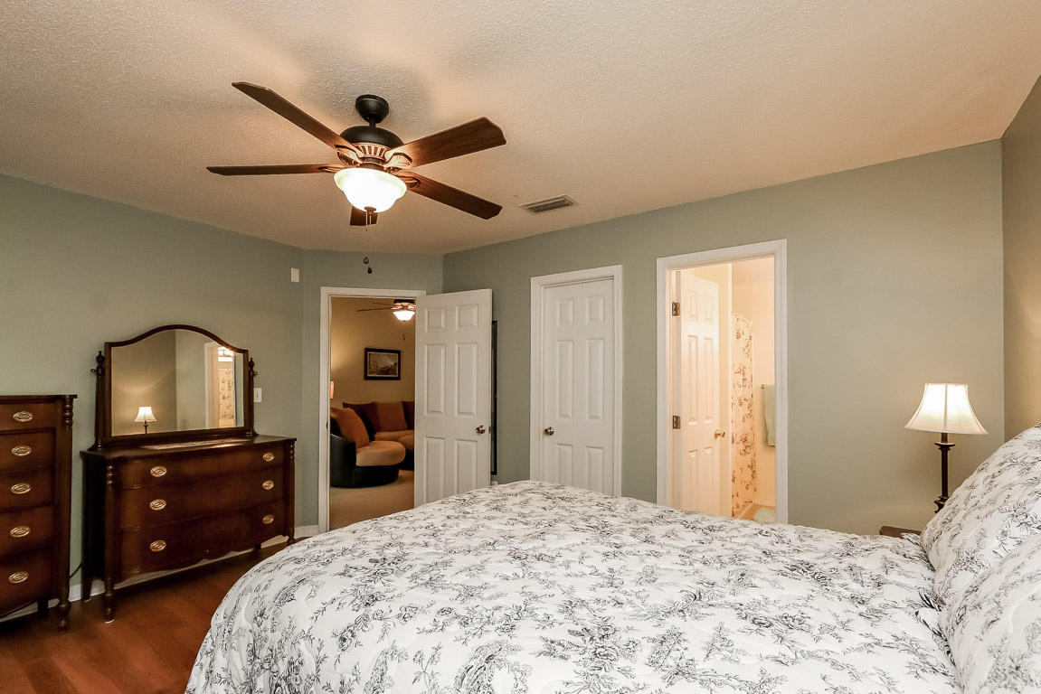 204 Vía Largo Santa Rosa Beach, FL 32459 - Photo 19 of 29 a bedroom with a bed and a dresser