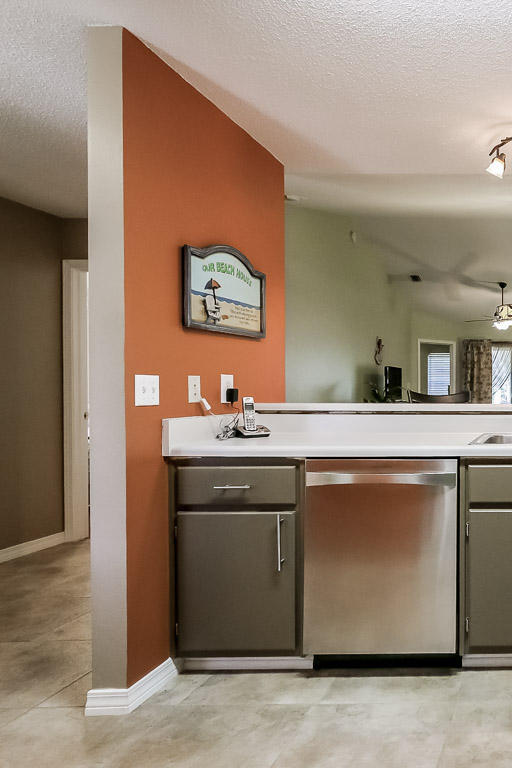 204 Vía Largo Santa Rosa Beach, FL 32459 - Photo 10 of 29 a view of a sink and a refrigerator