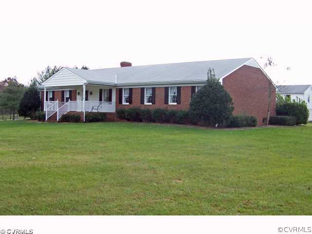 565 Broad St Road Manakin-Sabot, VA 23103 - Photo 1 of 8 a front view of a house with garden