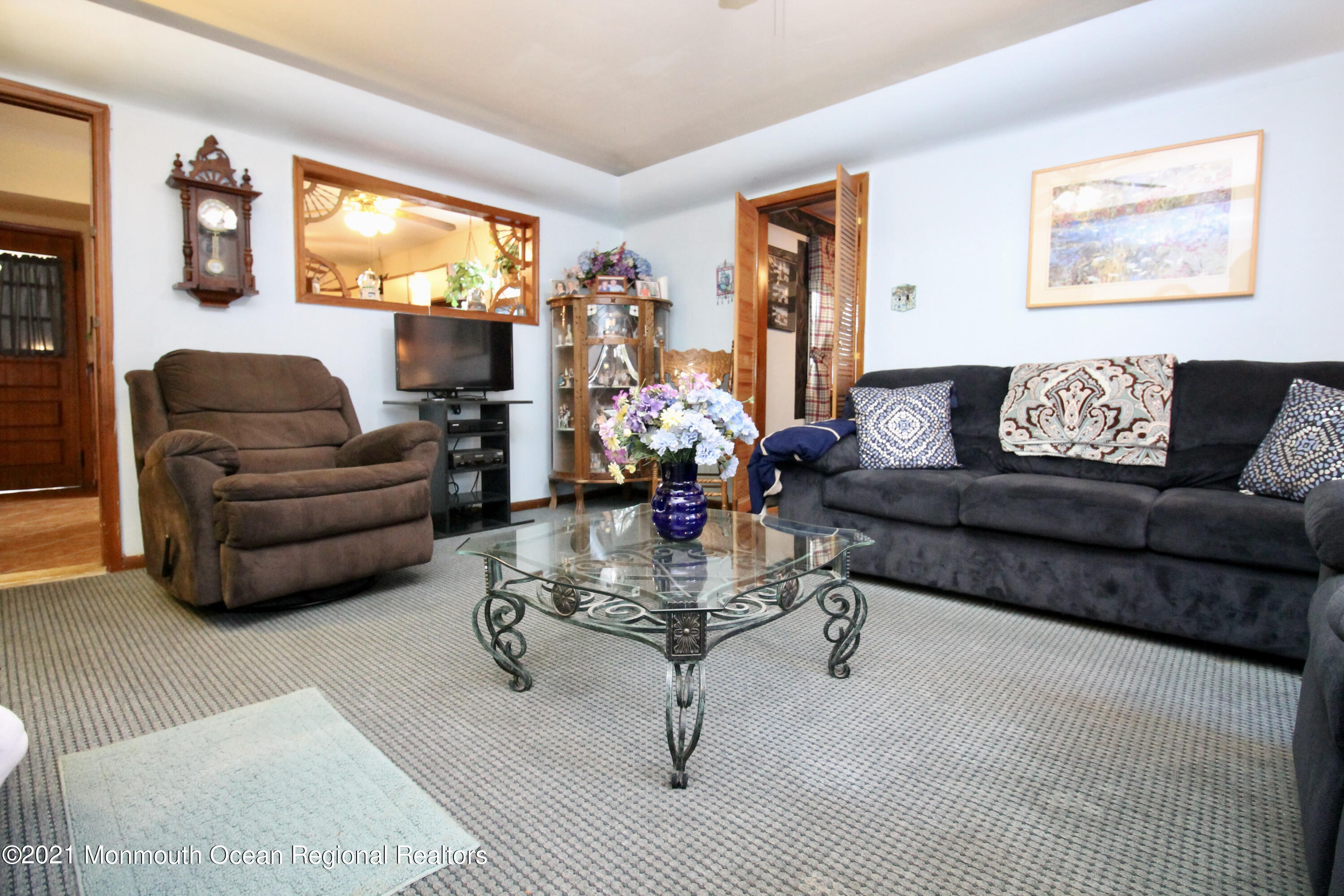 195 Bennett Road Freehold, NJ 07728 - Photo 14 of 90 a living room with furniture and a flat screen tv