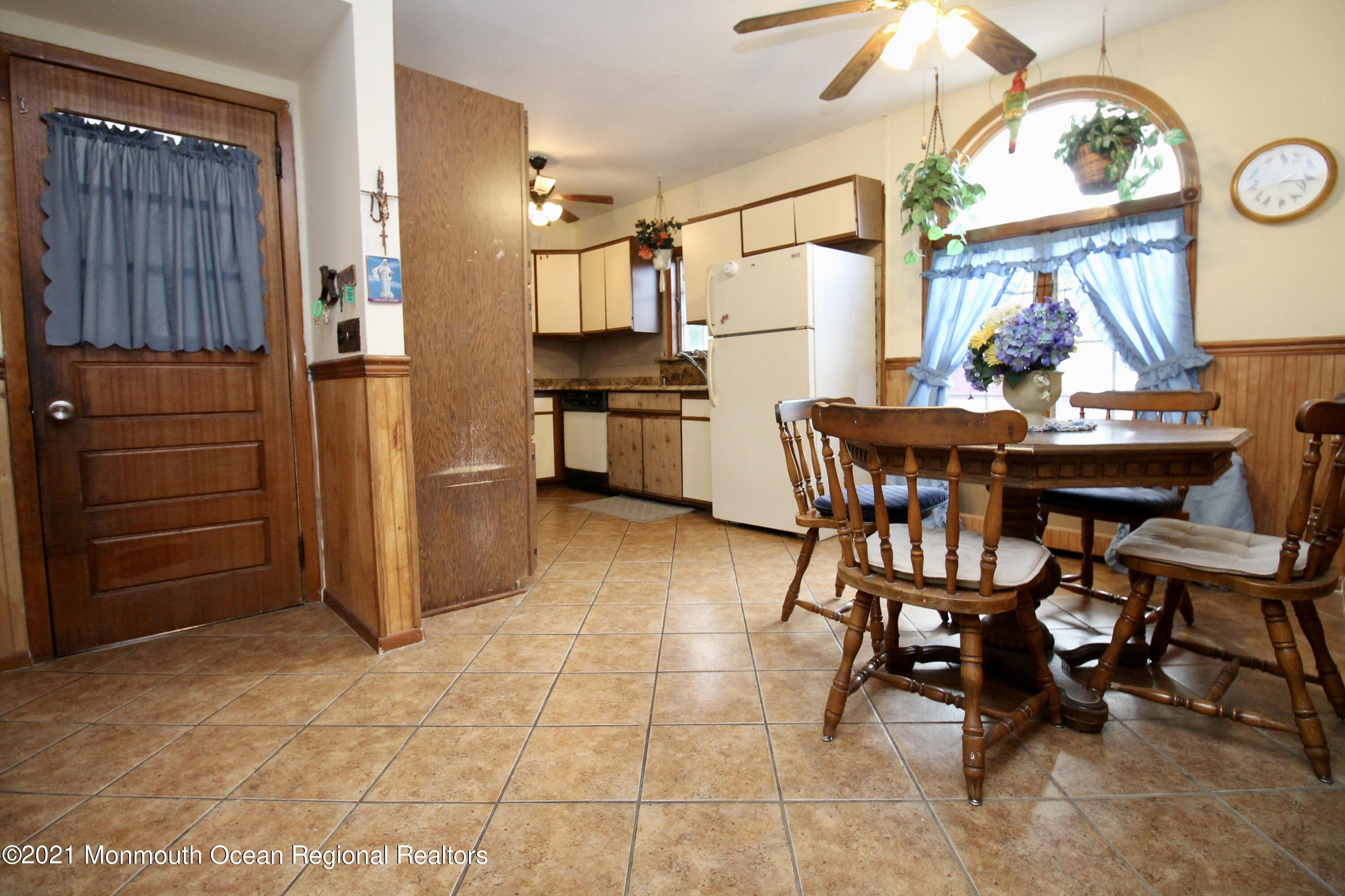195 Bennett Road Freehold, NJ 07728 - Photo 16 of 90 a view of a dining room with furniture and window