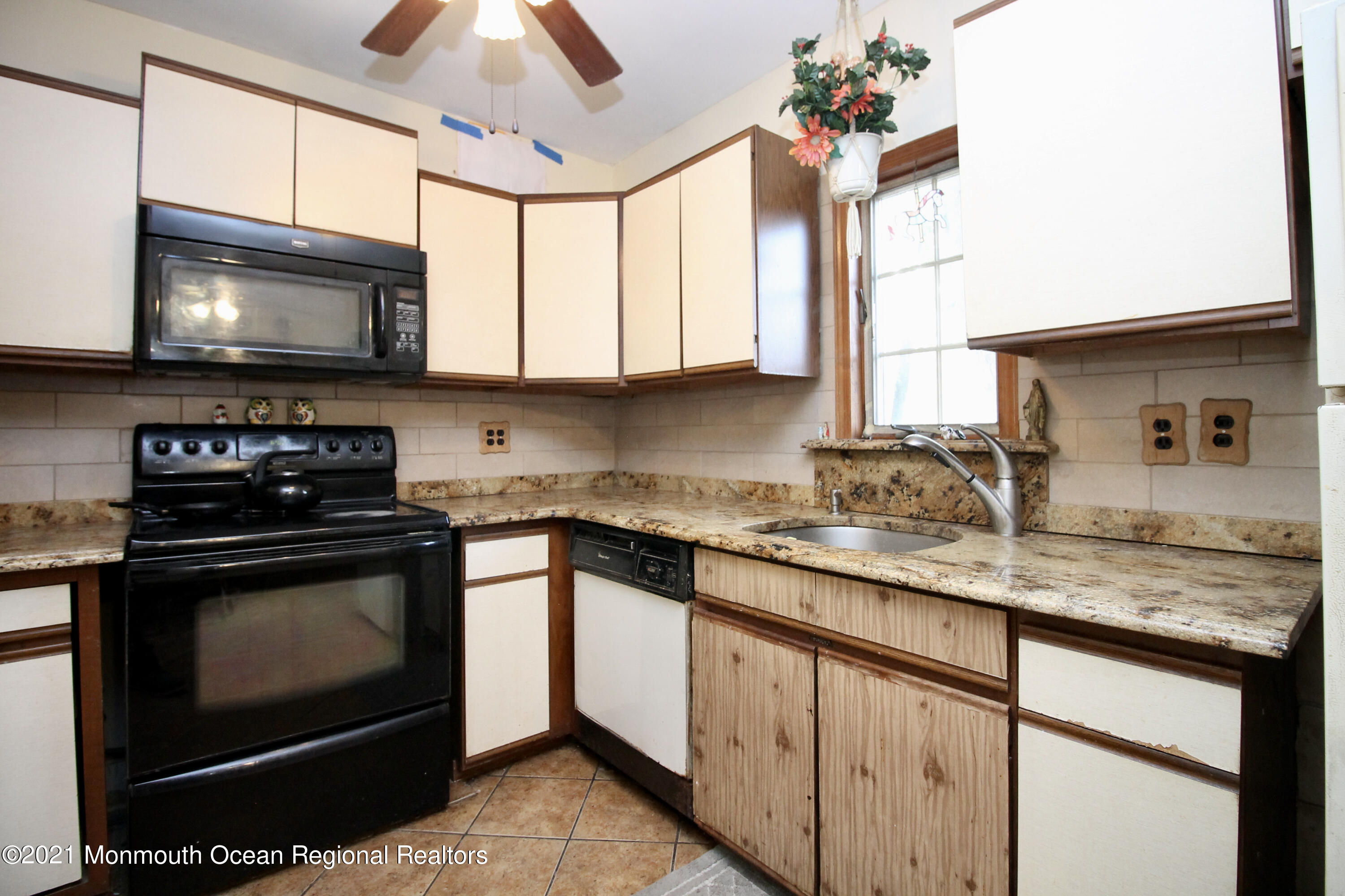 195 Bennett Road Freehold, NJ 07728 - Photo 19 of 90 a kitchen with stainless steel appliances granite countertop a sink stove and microwave