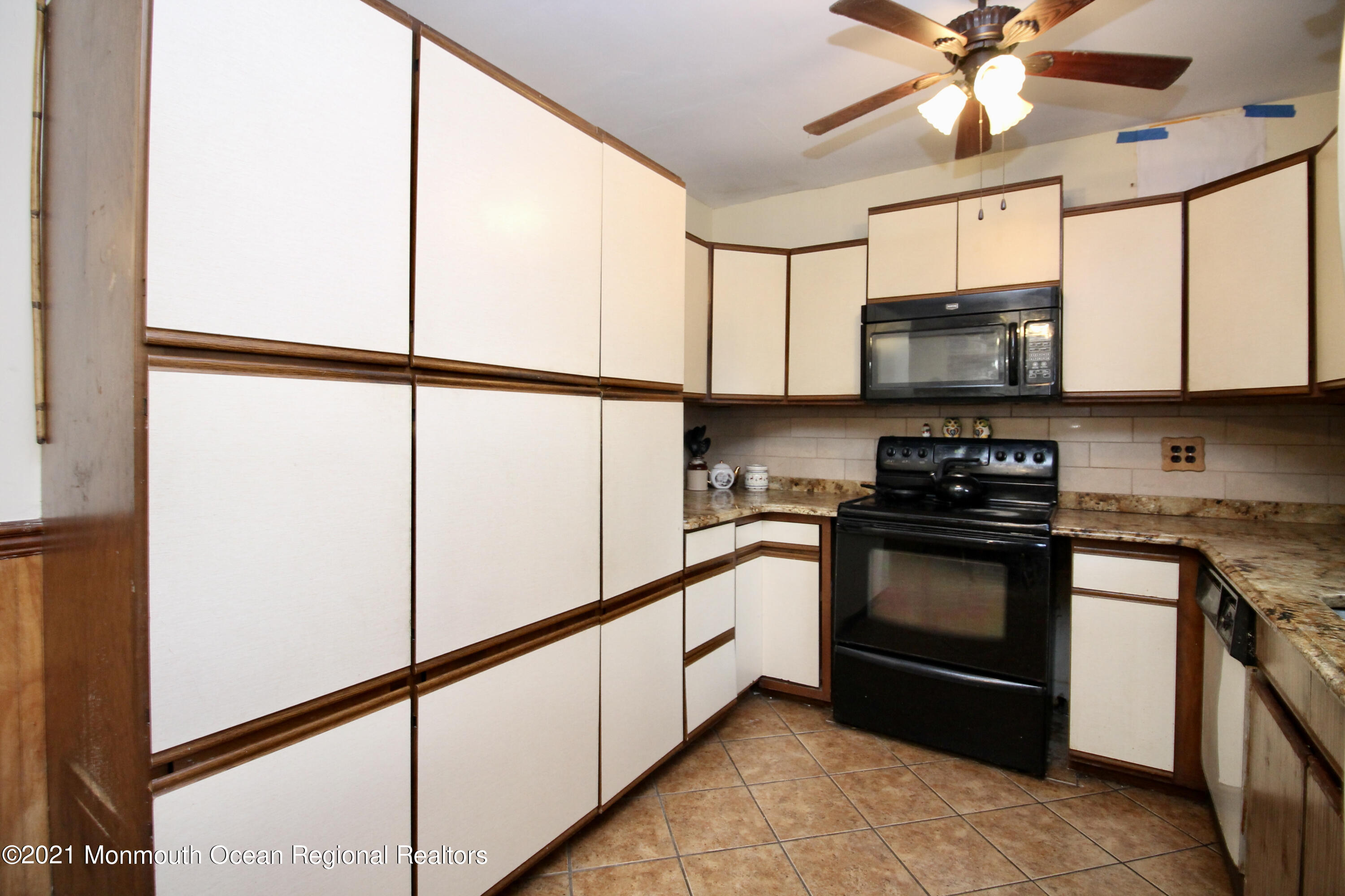 195 Bennett Road Freehold, NJ 07728 - Photo 20 of 90 a kitchen with stainless steel appliances granite countertop a refrigerator a stove a sink and a microwave