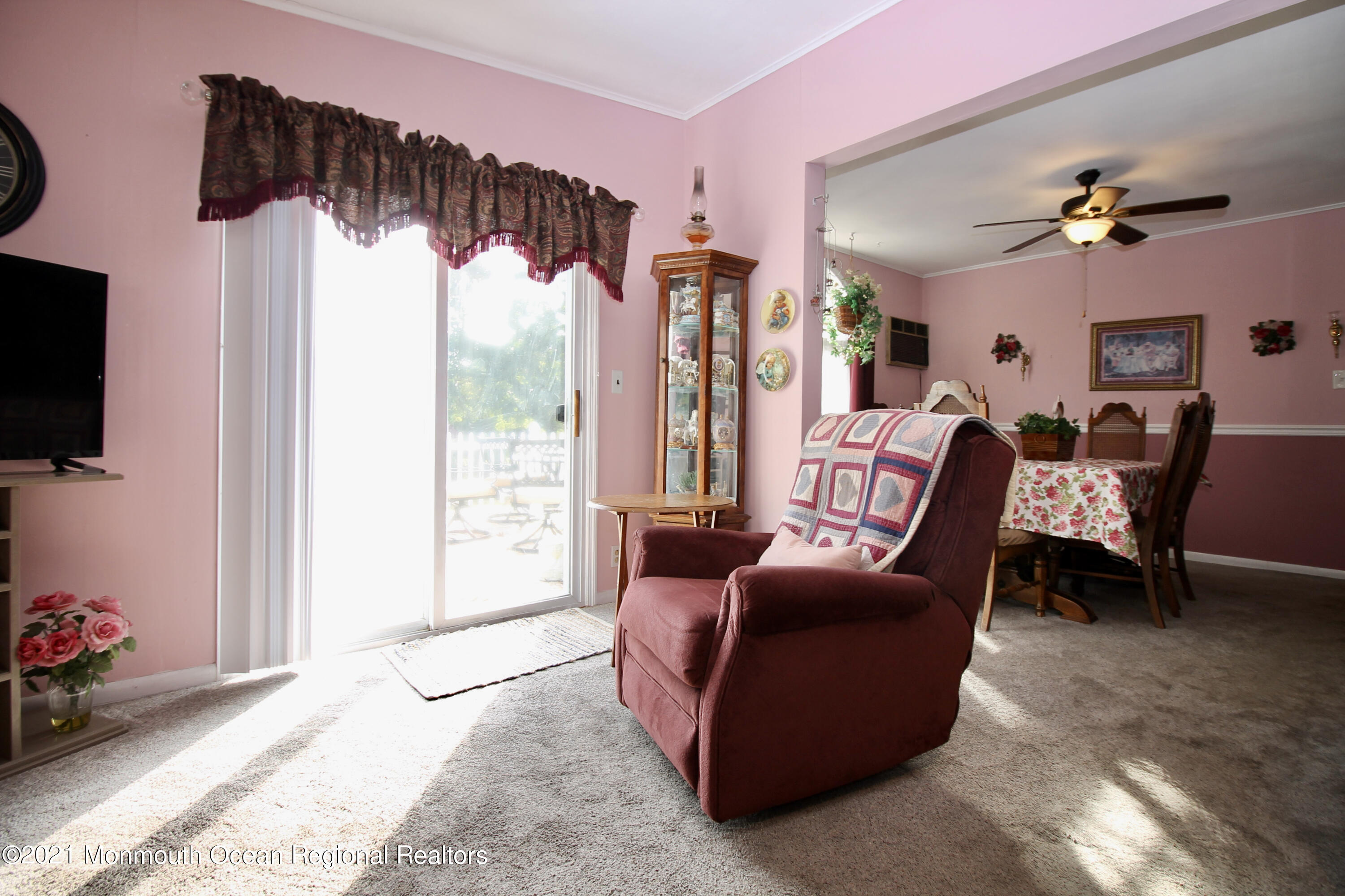 195 Bennett Road Freehold, NJ 07728 - Photo 26 of 90 a view of a livingroom with furniture and a flat screen tv