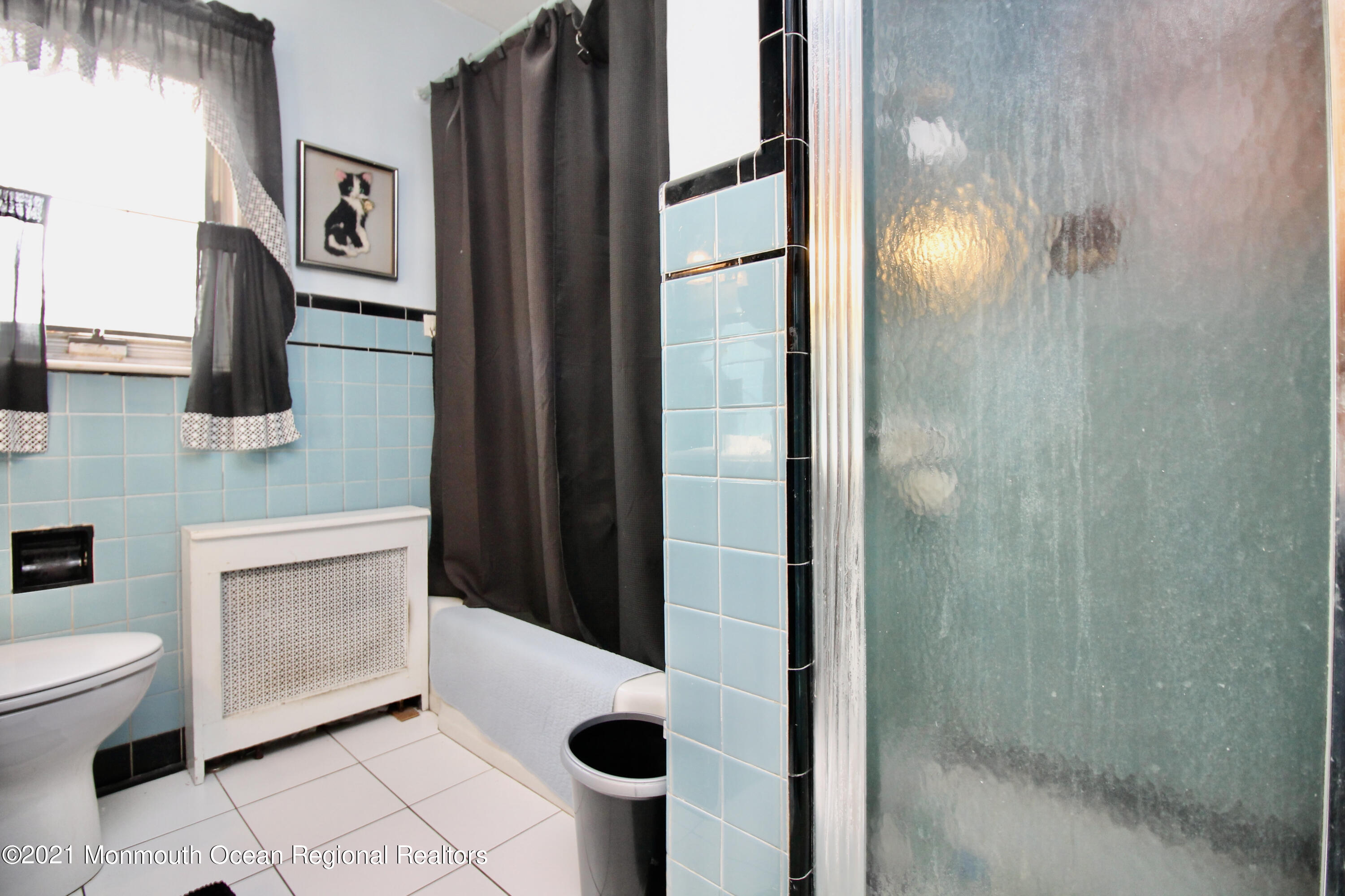 195 Bennett Road Freehold, NJ 07728 - Photo 31 of 90 a bathroom with a toilet a sink and shower